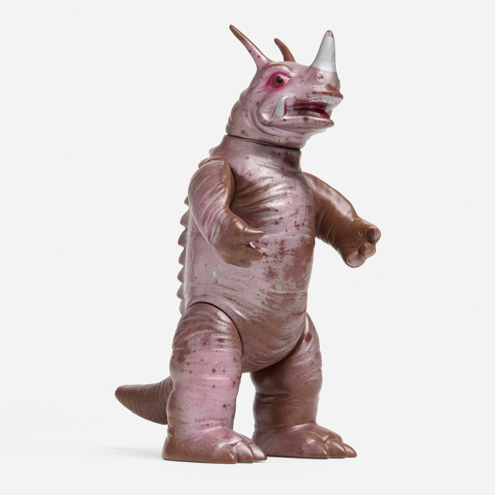 Bullmark Ultraman Neronga Standard Vinyl Metallic Pink: Bullmark Ultraman Neronga Standard Vinyl Metallic Pink Bullmark Japan, c. 1970 8.75 h x 4.25 w x 5.75 d in (22 x 11 x 15 cm) Scarce color variation with metallic pink spray over brown vinyl. Condition