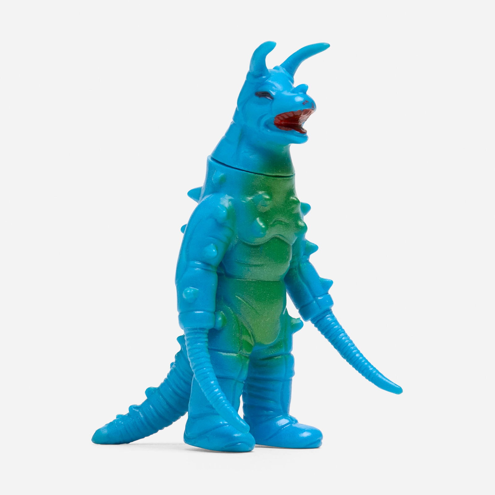 Tsubaraya Enterprise Return of Ultraman Gudon Mini Vinyl: Tsubaraya Enterprise Return of Ultraman Gudon Mini Vinyl Enterprise Japan, c. 1970 4 h x 2.25 w x 3 d in (10 x 6 x 8 cm) Condition notes: Overall very good condition with minimal scattered paint rubs.