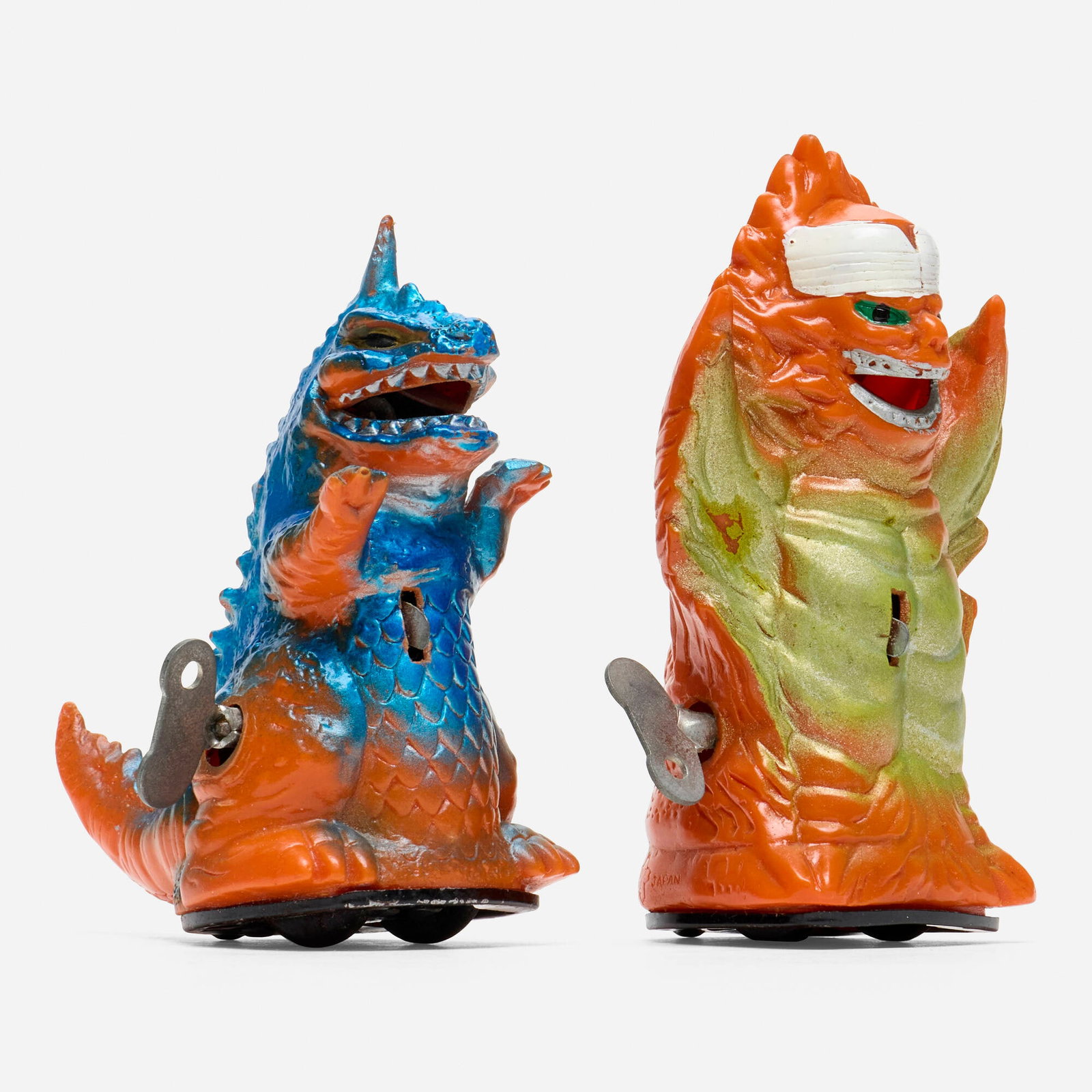 Yonezawa Pachi Godzilla and Mirrorman KittyFire Wind-Up Sparklers: Yonezawa Pachi Godzilla and Mirrorman KittyFire Wind-Up Sparklers Yonezawa Japan, c. 1970 4.75 h x 3.25 w x 2.25 d in (12 x 8 x 6 cm) 4 h x 2.75 w x 4 d in (10 x 7 x 10 cm) Condition notes: Overall go