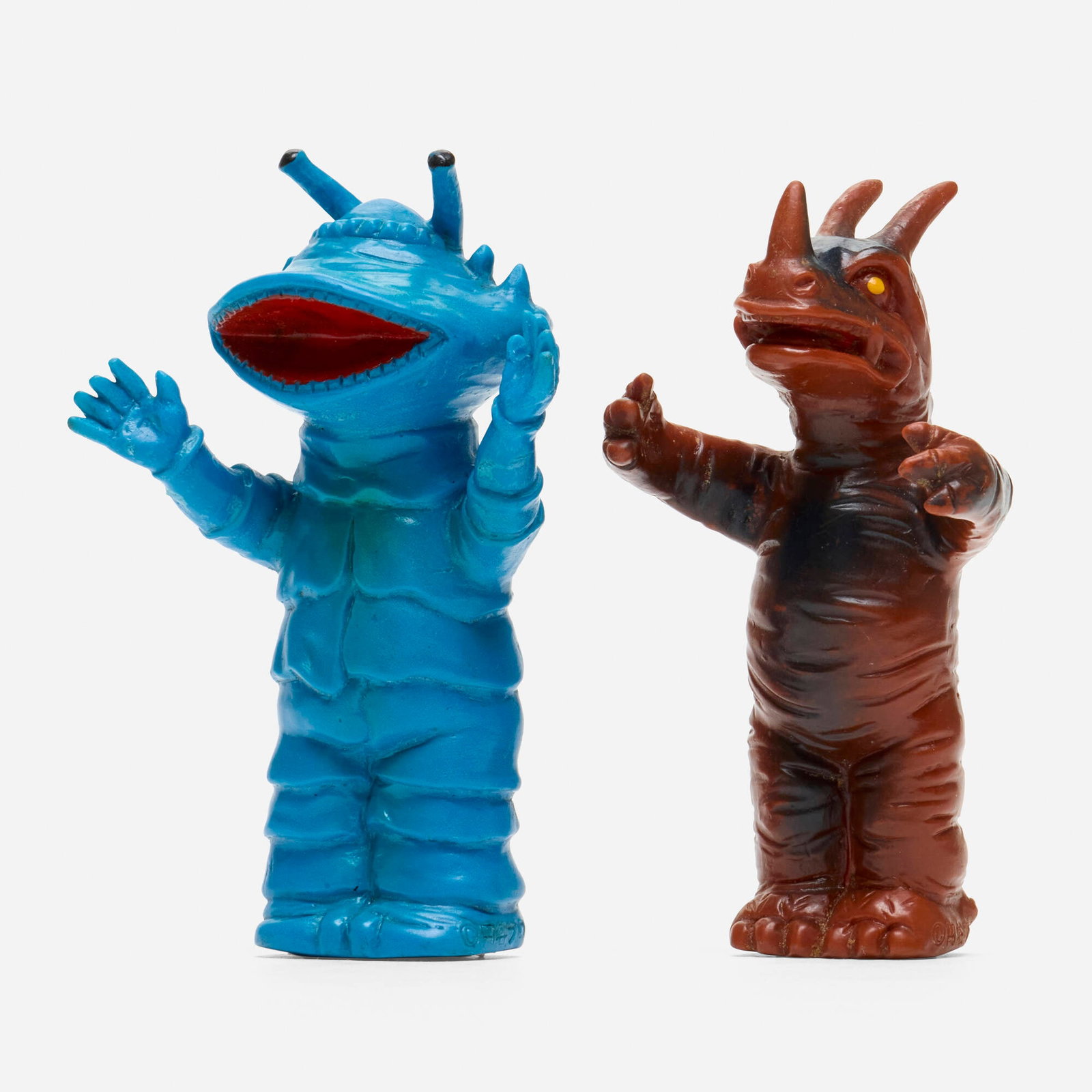 Osato Ultra Q Kaiju Vinyl Finger Puppet Group: Osato Ultra Q Kaiju Vinyl Finger Puppet Group Osato Japan, c. 1970 4.25 h x 2.75 w x 2 d in (11 x 7 x 5 cm) 4 h x 2.25 w x 2.25 d in (10 x 6 x 6 cm) Group includes a Kanegon and Neronga vinyl finger p