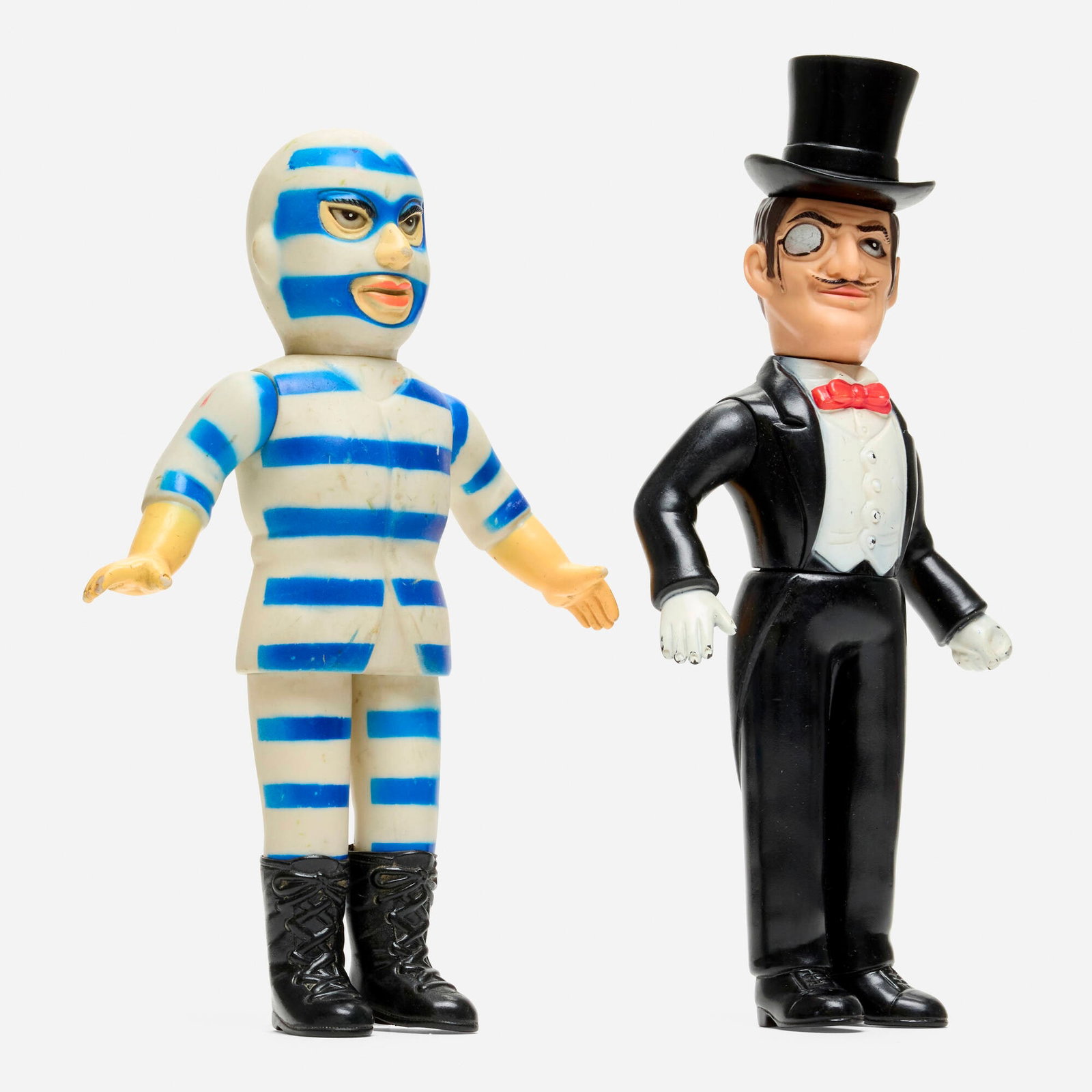Nakajima Tiger Mask Convict and Mr. X Standard Vinyl: Nakajima Tiger Mask Convict and Mr. X Standard Vinyl Nakajima Japan, c. 1970 11 h x 5.25 w x 2.5 d in (28 x 13 x 6 cm) 10.25 h x 6.5 w x 2 d in (26 x 17 x 5 cm) Condition notes: Overall good condition