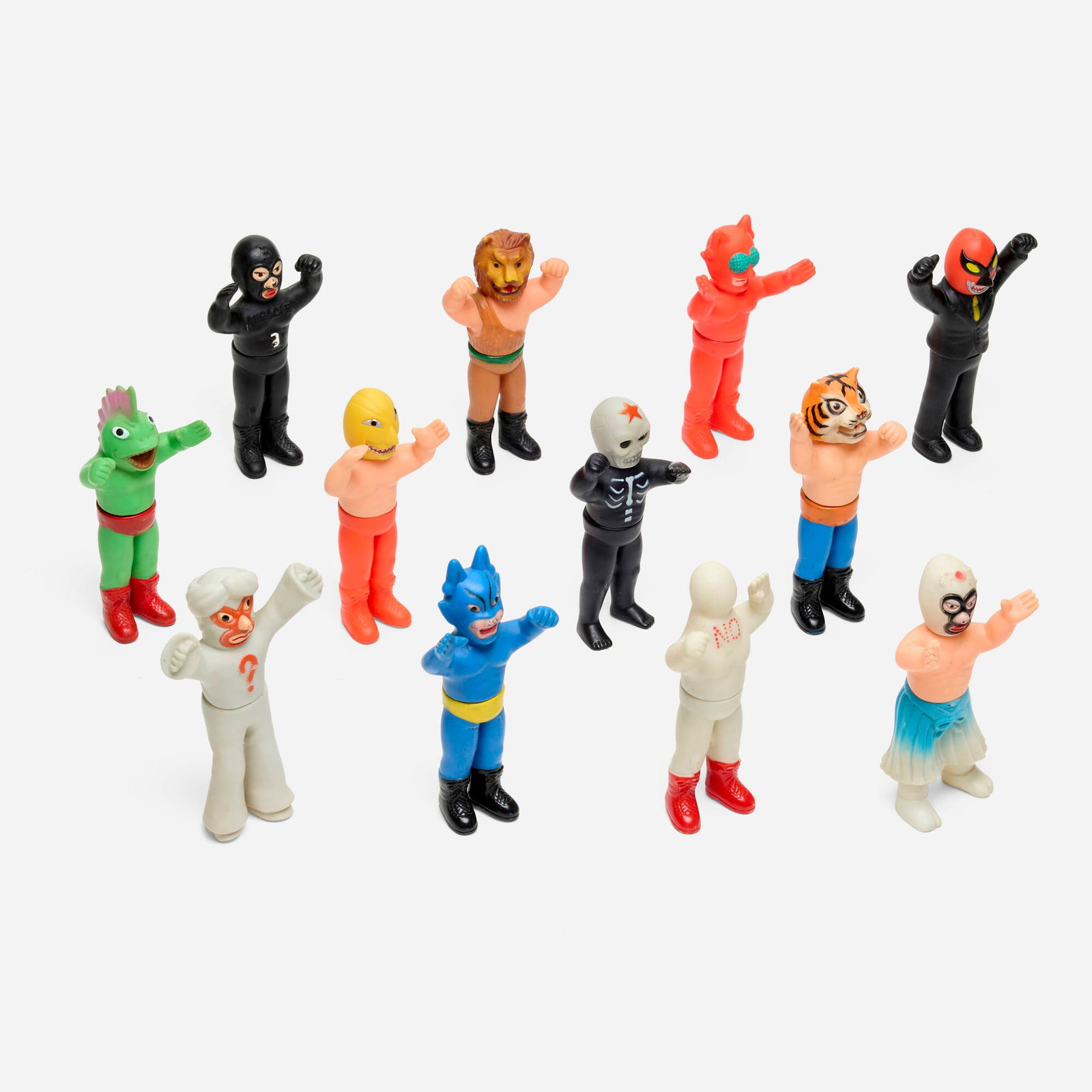 Nakajima Tiger Mask Mini Vinyl Wrestler Group of 12: Nakajima Tiger Mask Mini Vinyl Wrestler Group of 12 Nakajima Japan, c. 1970 4.75 h x 2.25 w x 2 d in (12 x 6 x 5 cm) Condition notes: Overall very good condition with minimal scattered paint rubs. Thi