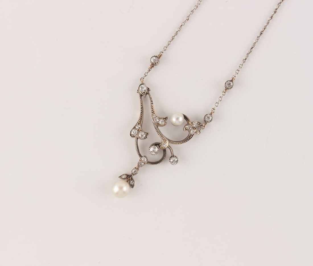 An early 20th century Belle Epoque diamond & pearl pendant necklace (1 of 2)
