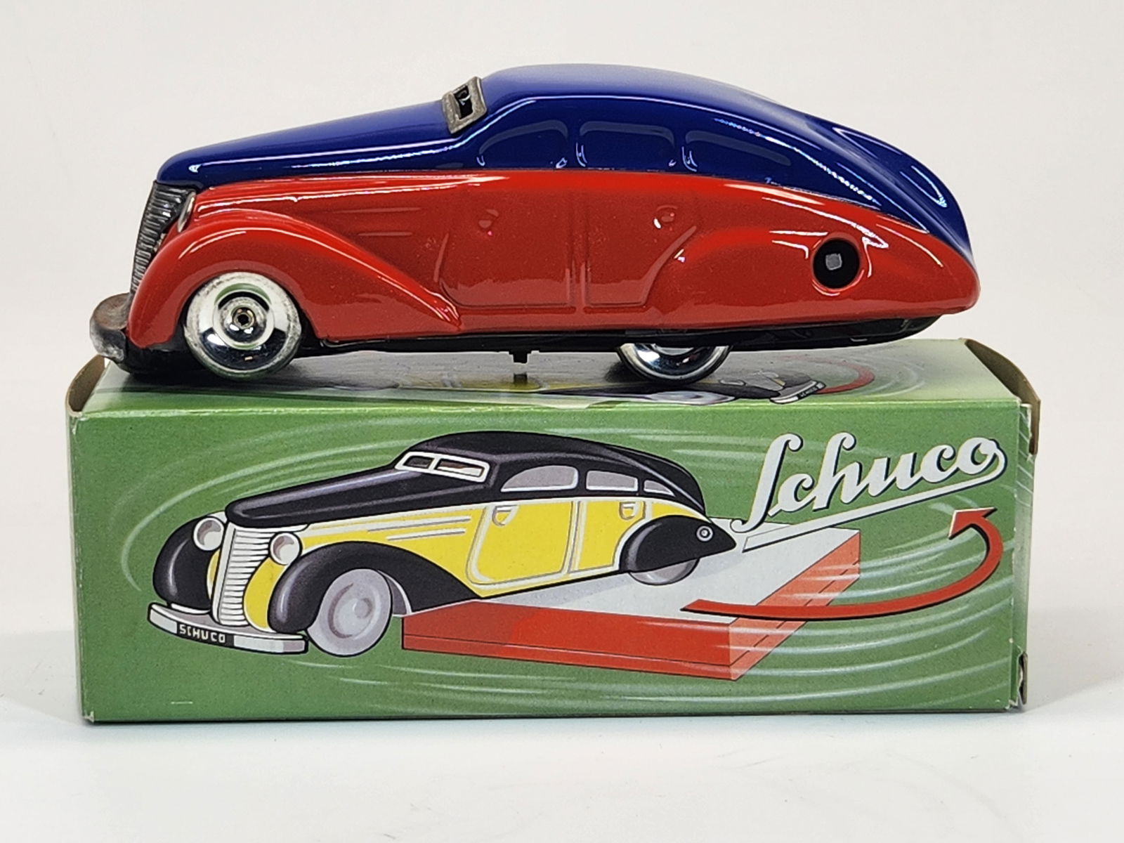 SCHUCO 1010 WIND UP STREAMLINED CAR W/ BOX (1 of 4)
