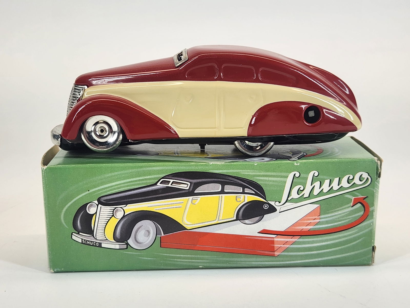 SCHUCO 1010 WIND UP STREAMLINED CAR W/ BOX (1 of 5)