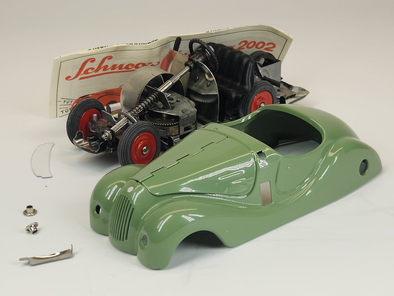 SCHUCO AKUSTICO ROADSTER WIND UP CAR: REMAINS IN GOOD CONDITION, SHOWING SOME TYPICAL USAGE WEAR.