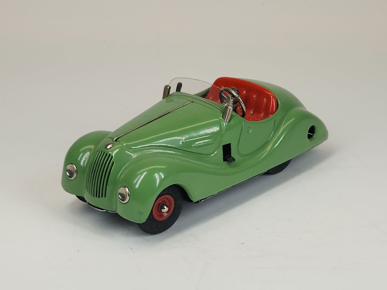 VINTAGE SCHUCO EXAMICO 4001 WIND UP CAR: REMAINS IN GOOD CONDITION, SHOWING SOME TYPICAL USAGE WEAR.