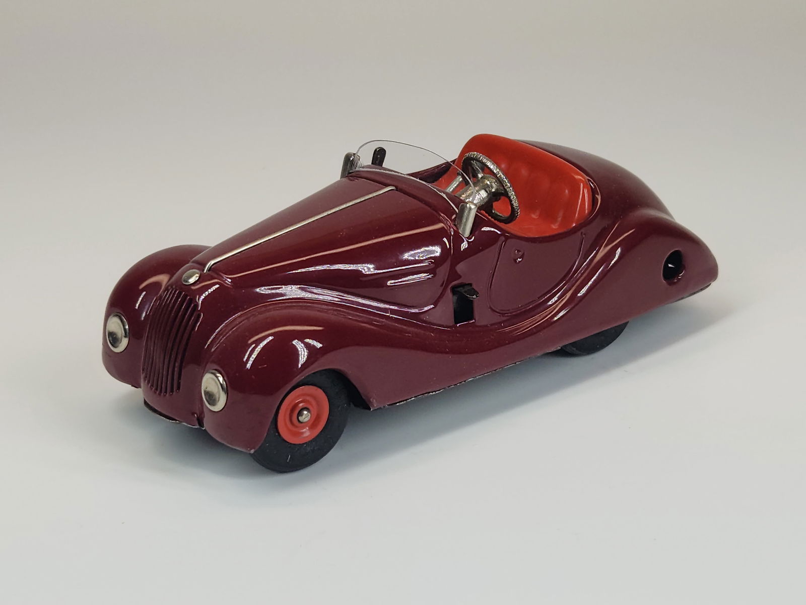 VINTAGE SCHUCO EXAMICO 4001 WIND UP CAR: REMAINS IN GOOD CONDITION, SHOWING SOME TYPICAL USAGE WEAR.