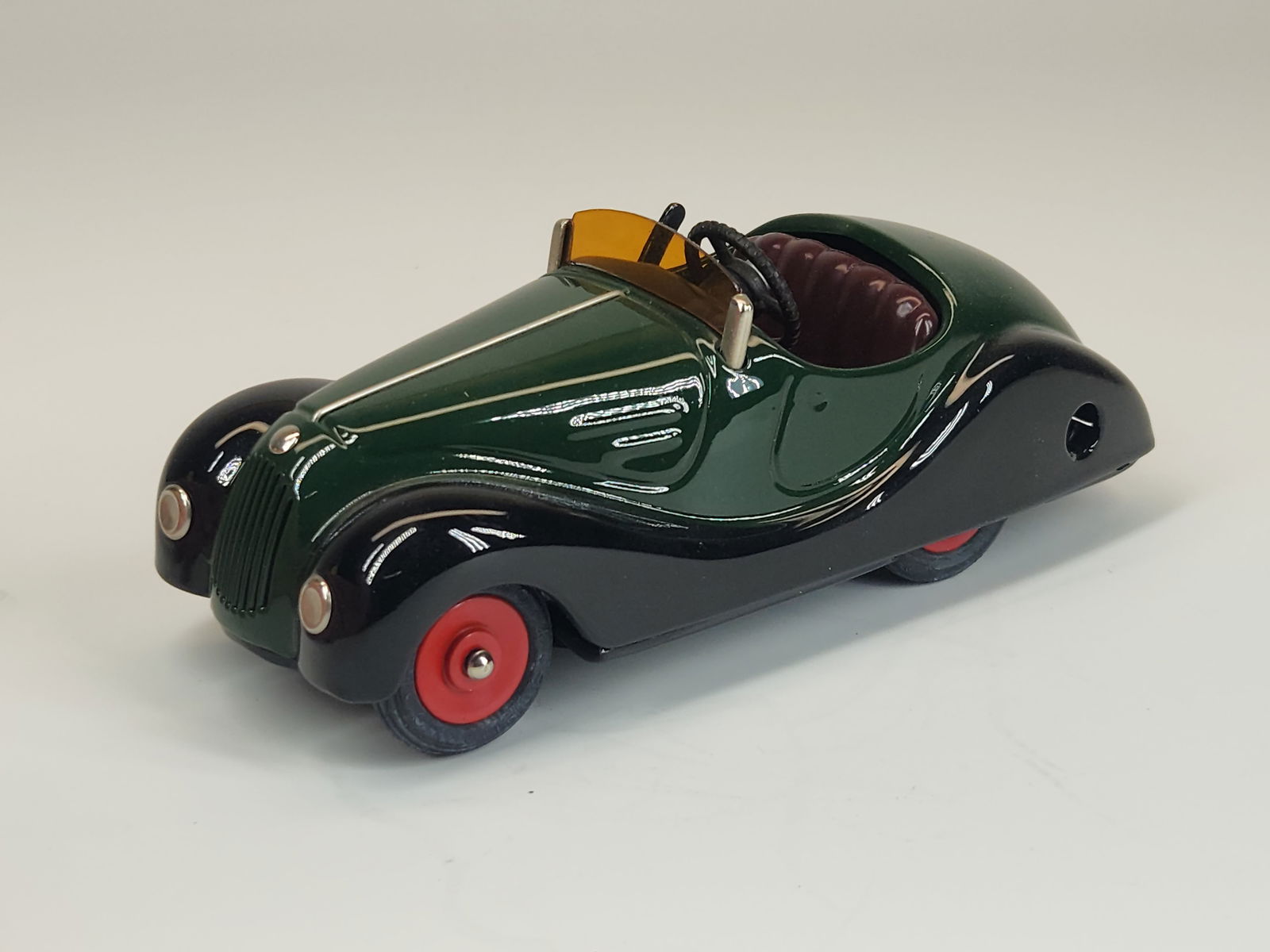 SCHUCO AKUSTICO 2002 WIND UP CAR: REMAINS IN GOOD CONDITION, SHOWING SOME TYPICAL USAGE WEAR.