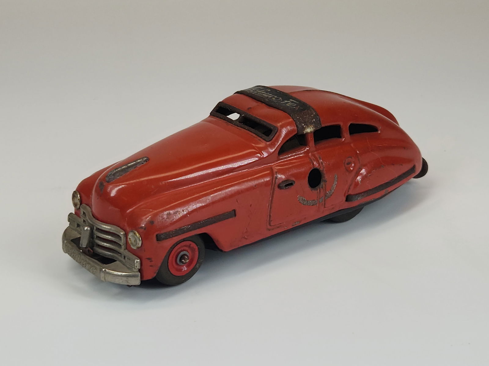 VINTAGE SCHUCO FEX 1111 WIND UP CAR: REMAINS IN GOOD CONDITION, SHOWING SOME TYPICAL USAGE WEAR.