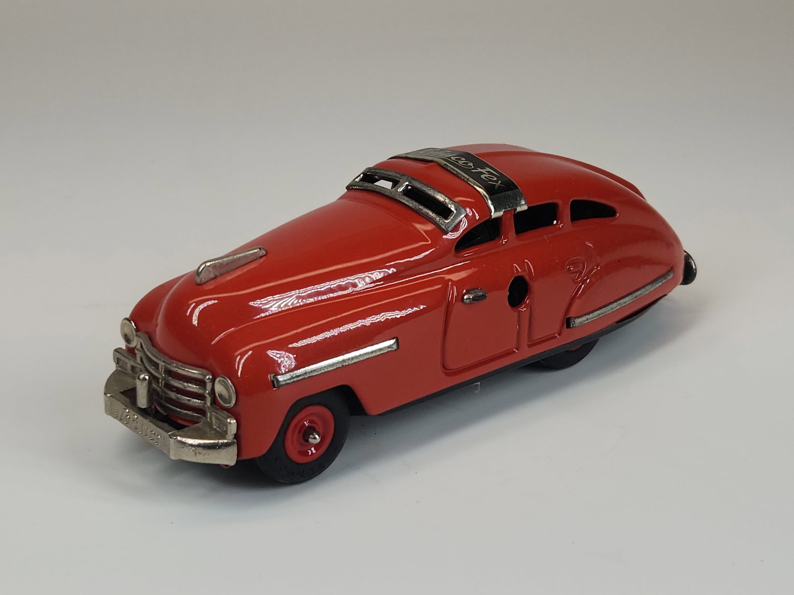 SCHUCO FEX 1111 WIND UP CAR: REMAINS IN GOOD CONDITION, SHOWING SOME TYPICAL USAGE WEAR.