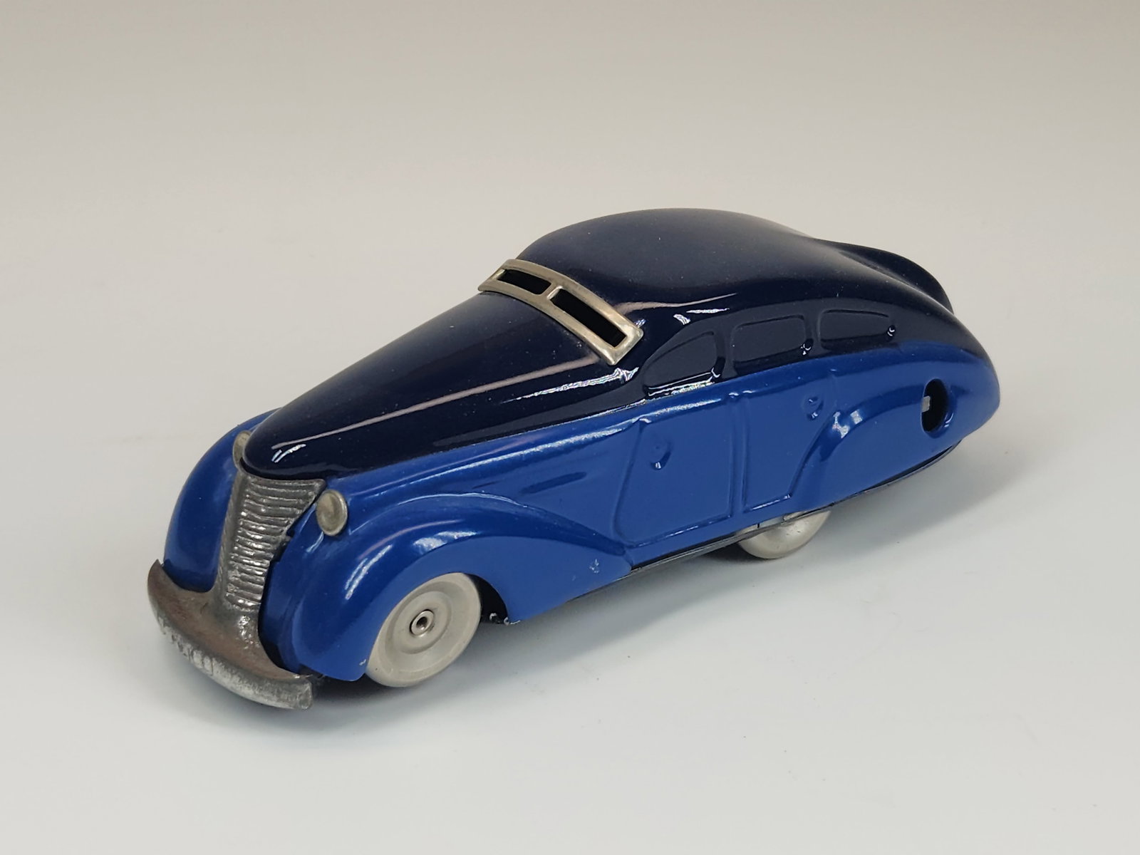 SCHUCO PATENT 1010 WIND UP CAR: REMAINS IN GOOD CONDITION, SHOWING SOME TYPICAL USAGE WEAR.