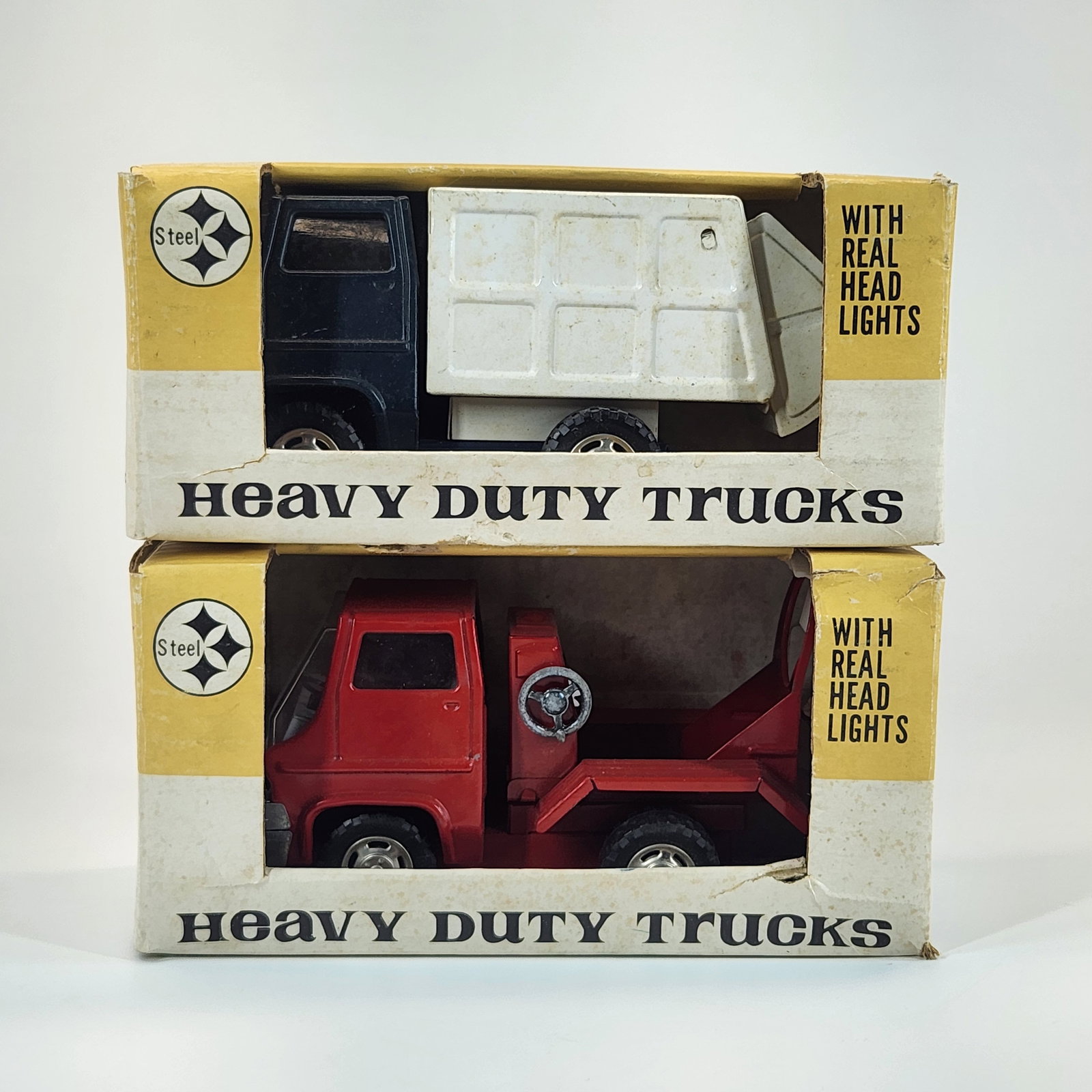 2) MIGHTY MARX PRESSED STEEL TRUCKS W/ BOX (1 of 2)