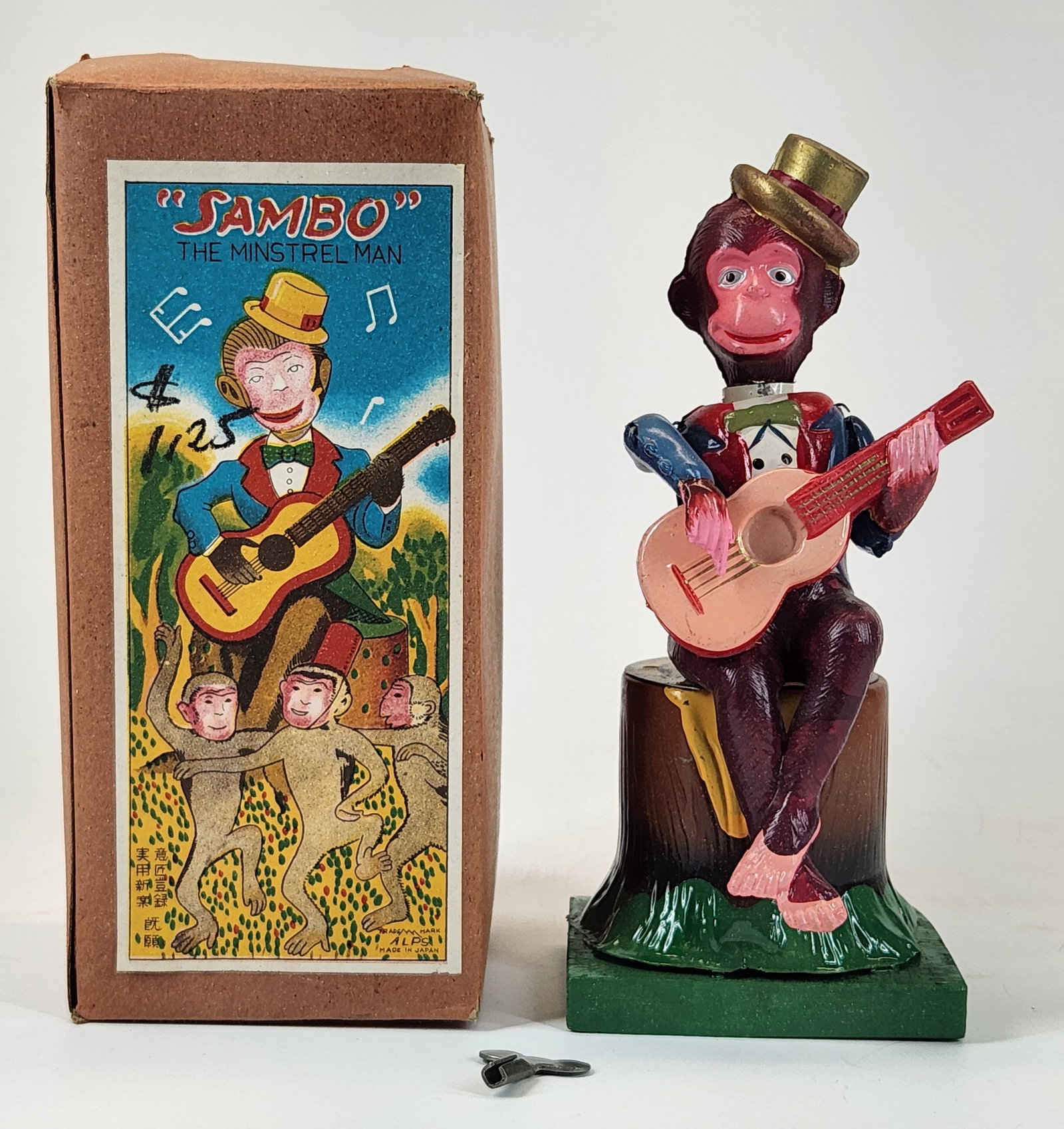 ALPS CELLULOID OCCUPIED JAPAN SAMBO MONKEY: REMAINS IN EXCELLENT VERY CLEAN WORKING CONDITION WITH BOX. BOX REMAINS NICE.