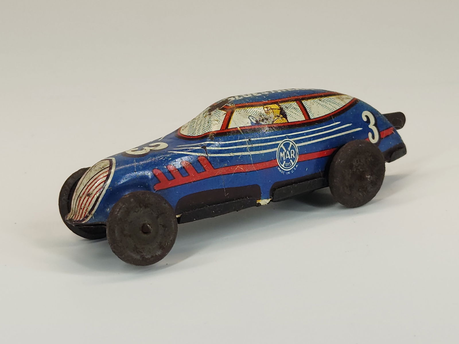 VINTAGE MARX TIN LITHO WIND UP RACE CAR - BLUESTREAK: REMAINS IN GOOD CONDITION, SHOWING SOME TYPICAL USAGE WEAR. UNTESTED.