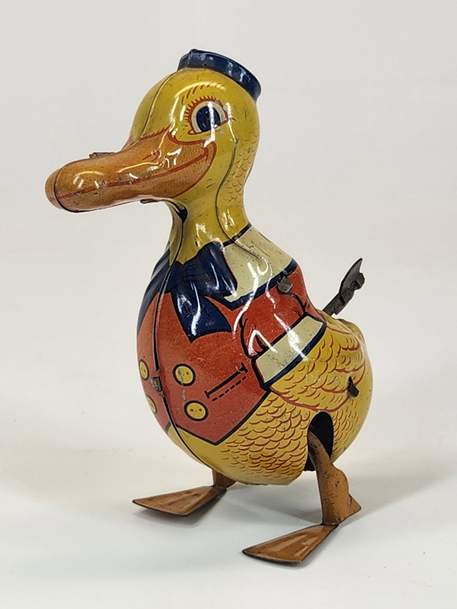 J. CHEIN TIN LITHO WIND UP DUCK: REMAINS IN GOOD CONDITION, SHOWING SOME WEAR. WORKING.