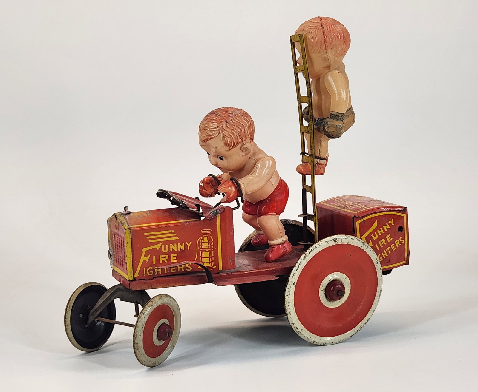 MARX TIN / CELLULOID FUNNY FIREFIGHTERS (1 of 6)