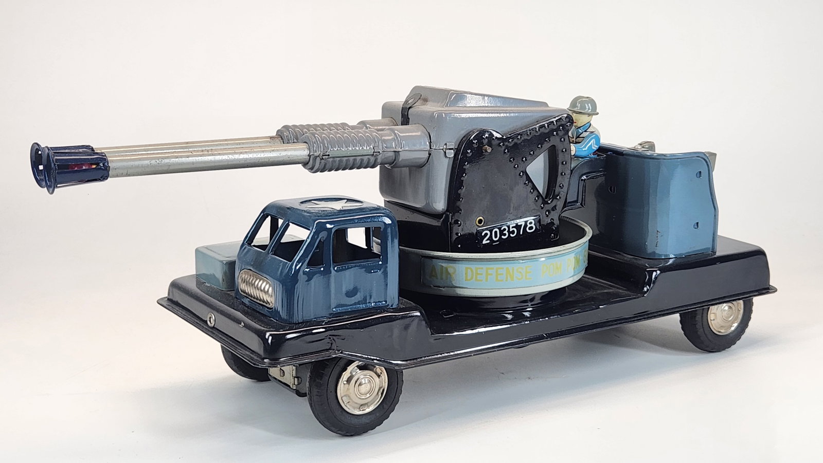 LINE MAR BATTERY OP AIR DEFENSE POM POM GUN: REMAINS IN GOOD CLEAN CONDITION, SHOWING ONLY SOME VERY MINIMAL WEAR.