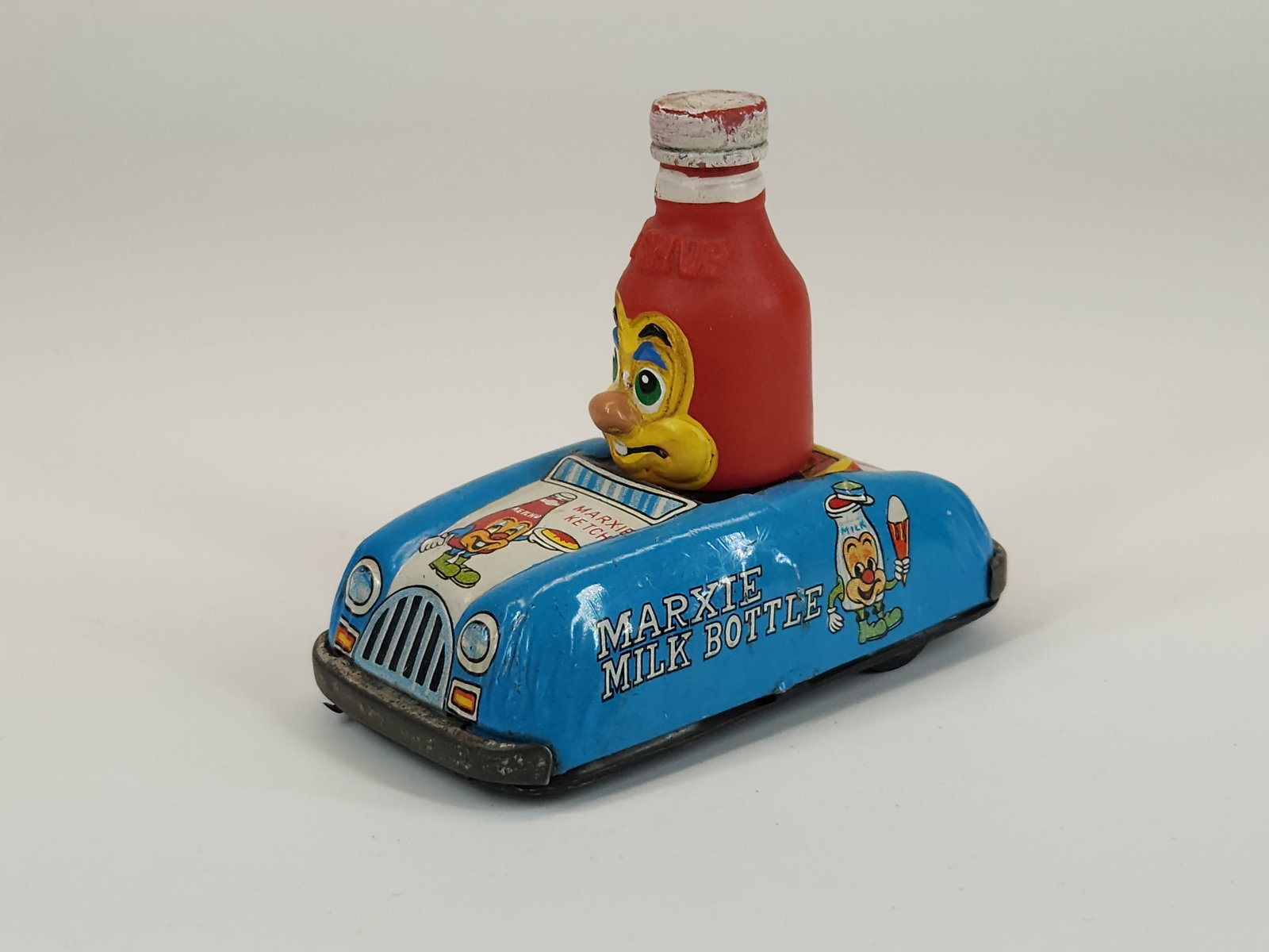 MARX TIN FRICTION MARXIE KETCHUP CAR: REMAINS IN GOOD CONDITION. FRICTION MOTOR DOES NOT WORK.