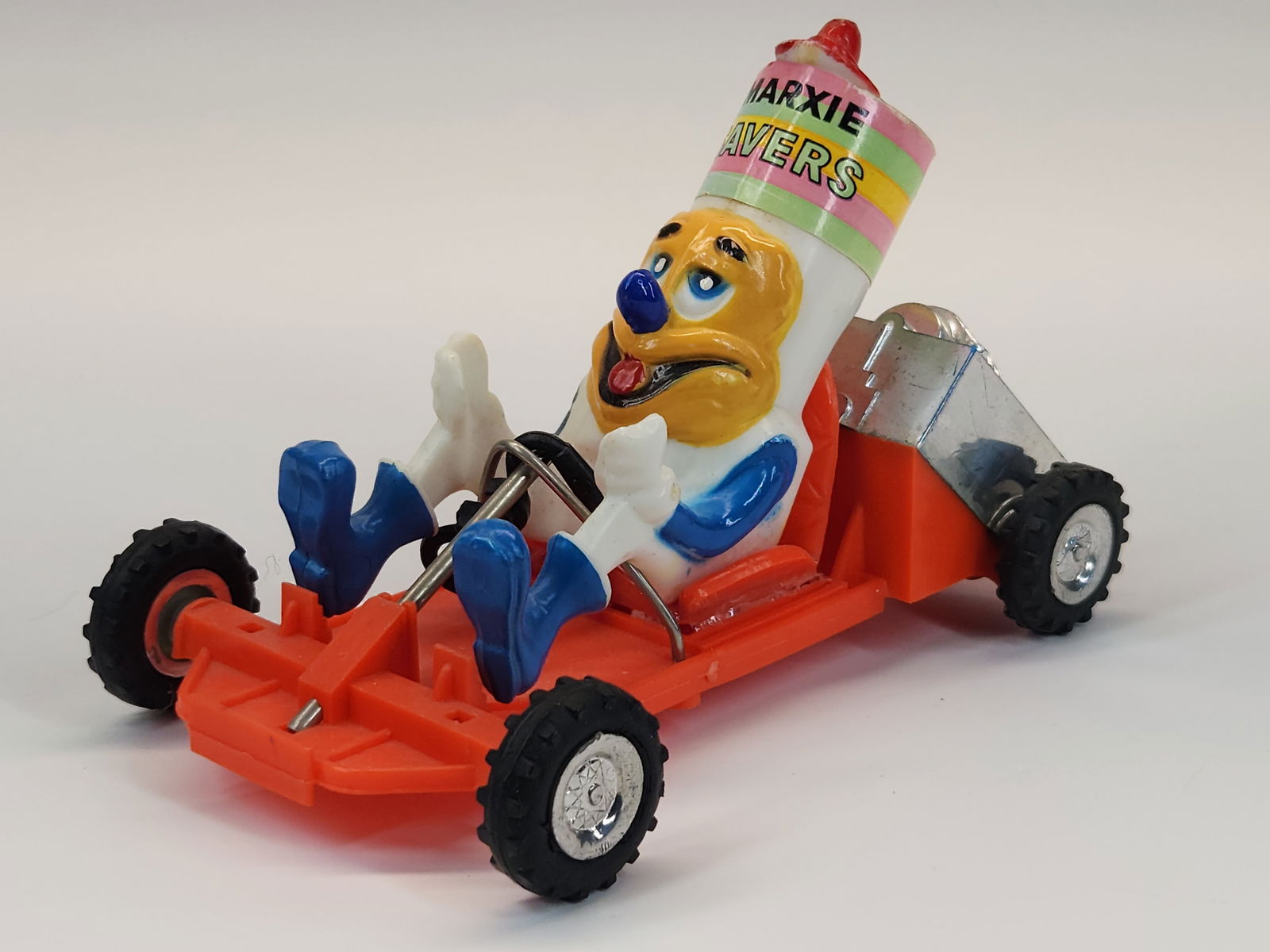 MARX PLASTIC FRICTION MARXIE SAVERS: REMAINS IN FAIR CONDITION. HANDLEBARS BROKEN OFF AND INCLUDED. MOTOR IS TIGHT.