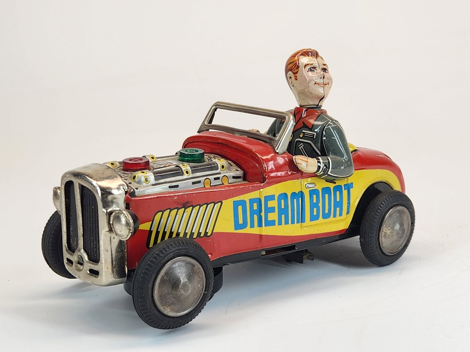 NOMURA TIN BATTERY OP DREAMBOAT HOT ROD: REMAINS IN VERY GOOD CONDITION, SHOWING SOME MINIMAL WEAR. UNTESTED.