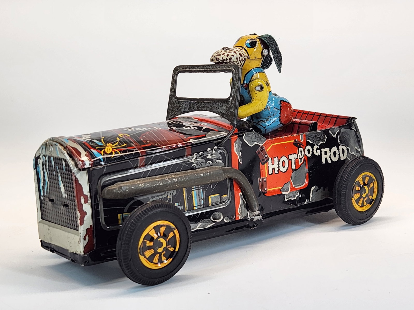 TRADEMARK TIN FRICTION HOT DOG ROD (1 of 4)