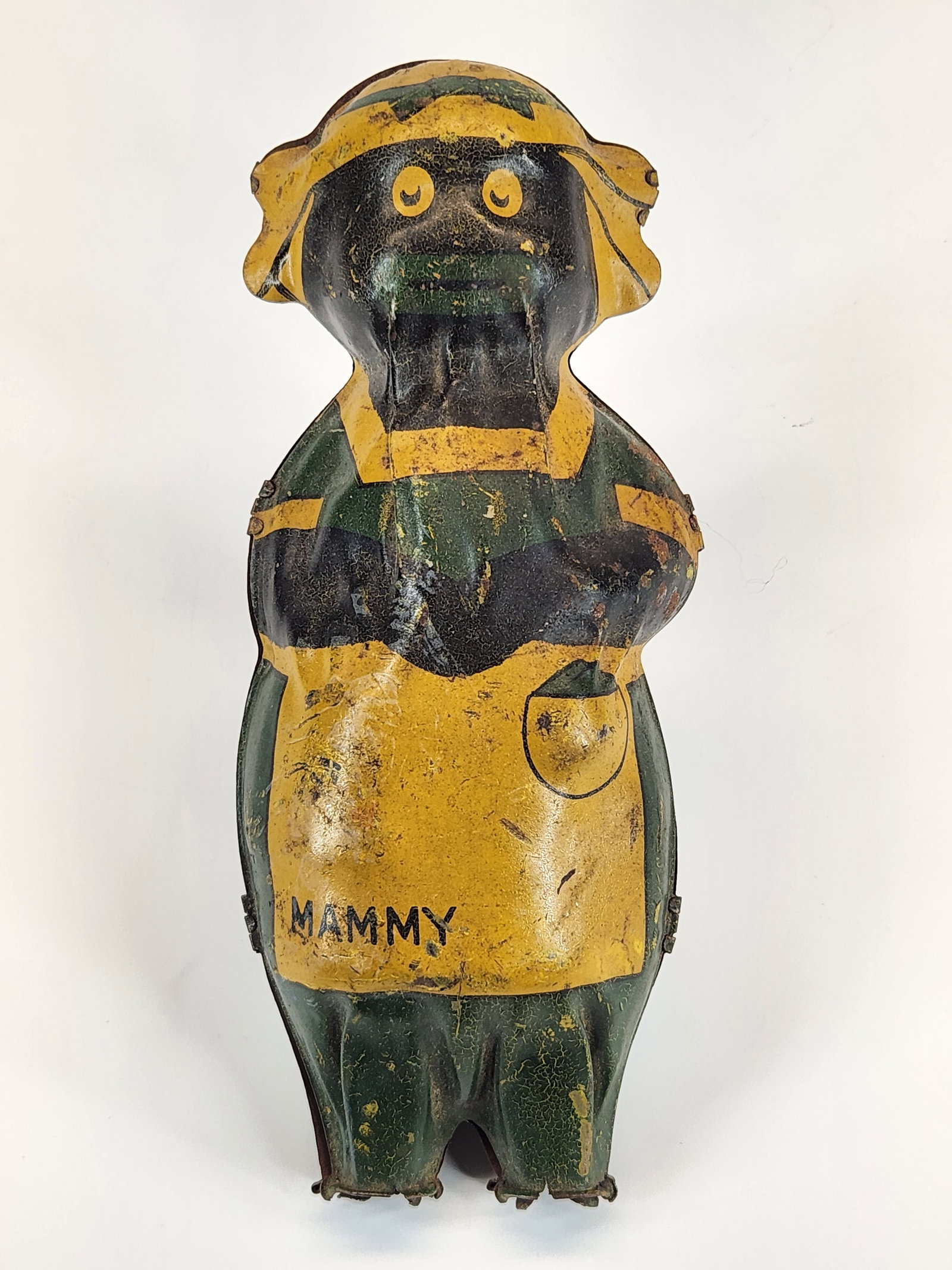 TIN LITHO WIND UP MAMMY TOY PART: REMAINS IN FAIR CONDITION, SHOWING WEAR. WIND UP MECHANISM WORKS. MISSING FEET.