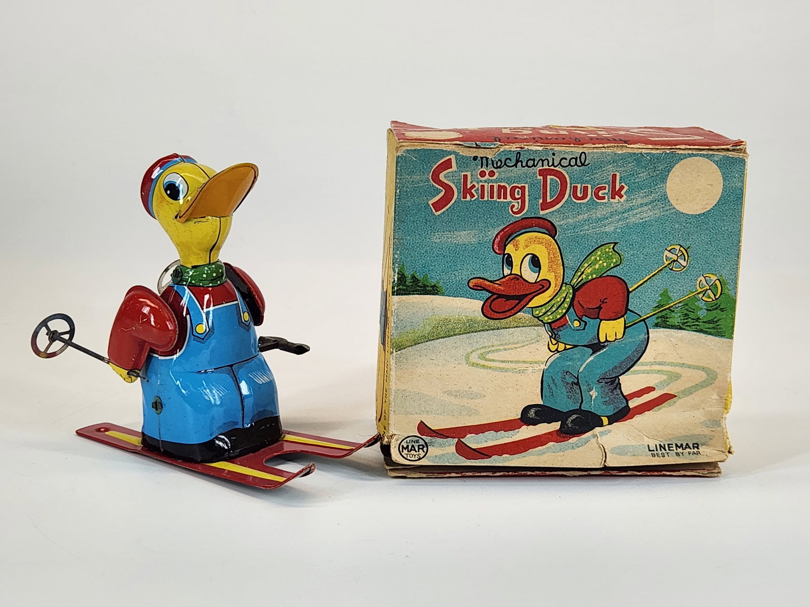 LINEMAR TIN WIND UP SKIING DUCK W/ BOX (1 of 6)