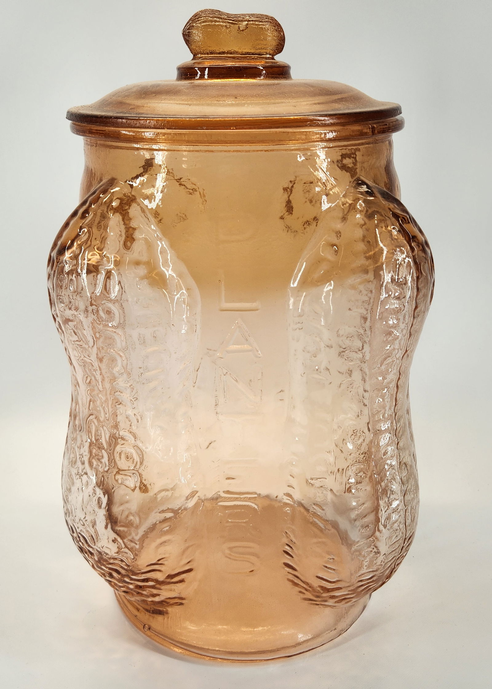 REPRODUCTION PLANTERS PEANUT JAR: REMAINS IN GOOD CONDITION. HAS SMALL CHIP ON LID. STANDS APPROXIMATELY 13" TALL