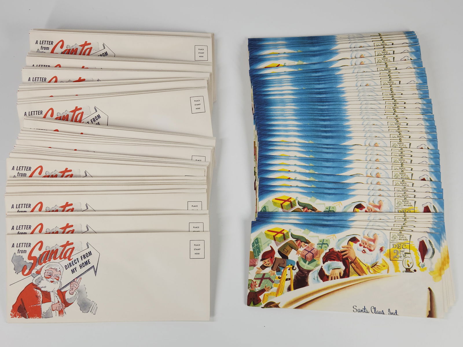 LARGE ASSORTMENT OF ESSO SANTA CLAUS LETTERS: ALL REMAIN IN EXCELLENT UNUSED CONDITION WITH MAILING ENVELOPE