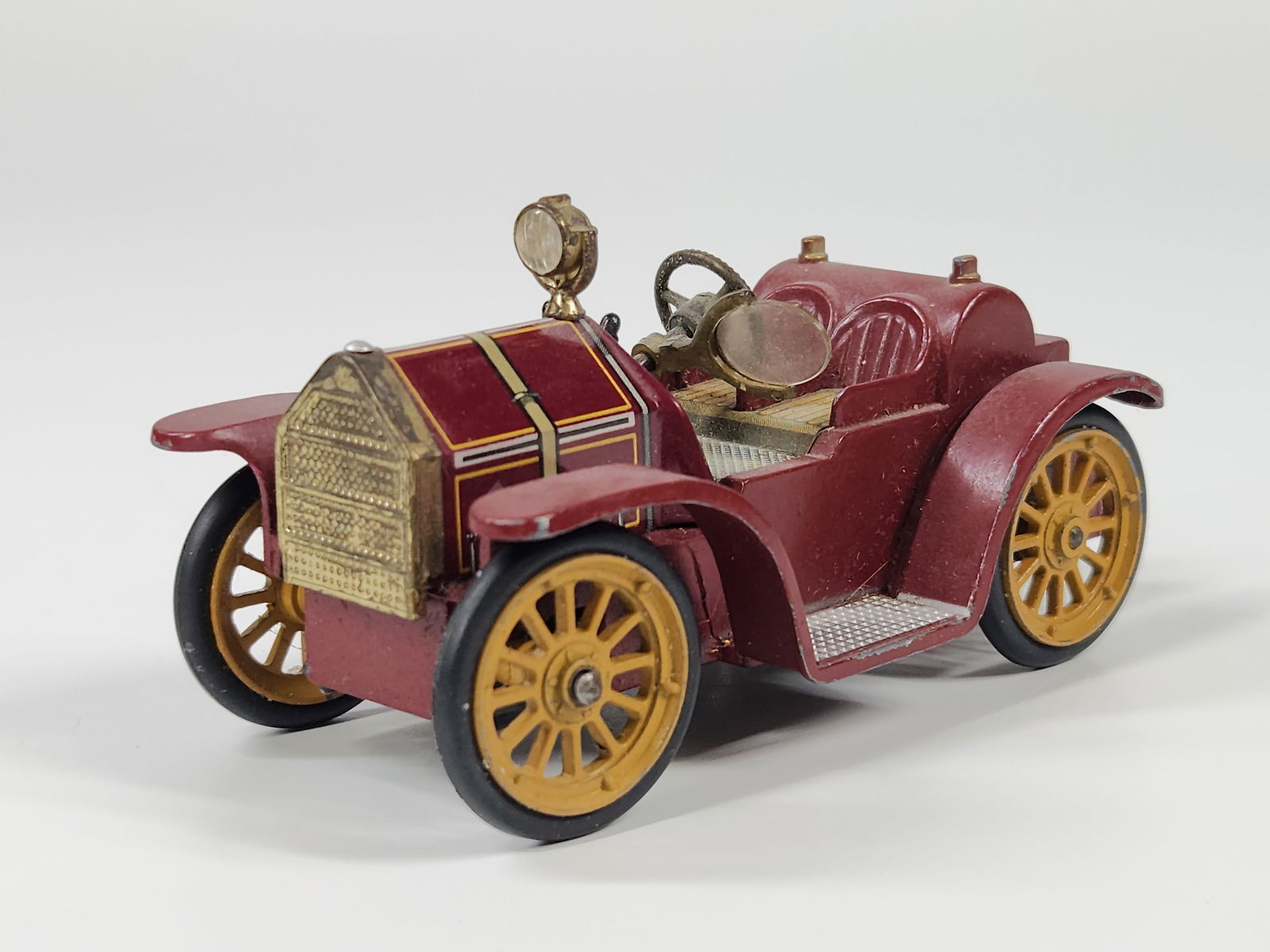 SCHUCO MICRO RACER OLD TIMER MERCER 35J: REMAINS IN GOOD CONDITION, SHOWING SOME TYPICAL WEAR. WIND UP MECHANISM DOES NOT WORK.