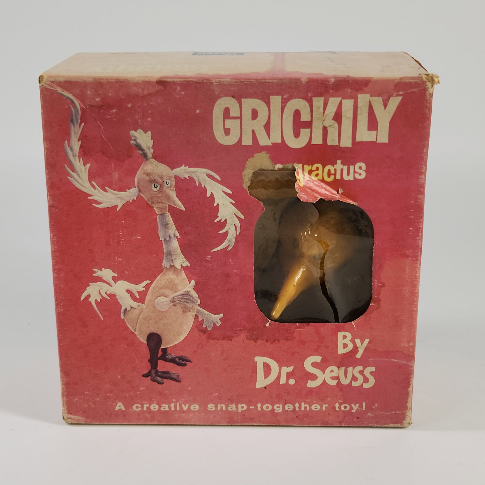 REVELL DR. SEUSS GRICKILY MODEL KIT: REMAINS IN VERY GOOD UNUSED CONDITION. CONTENTS REMAIN SEALED IN BAG. BOX SHOWS COLOR FADING THROUGHOUT.