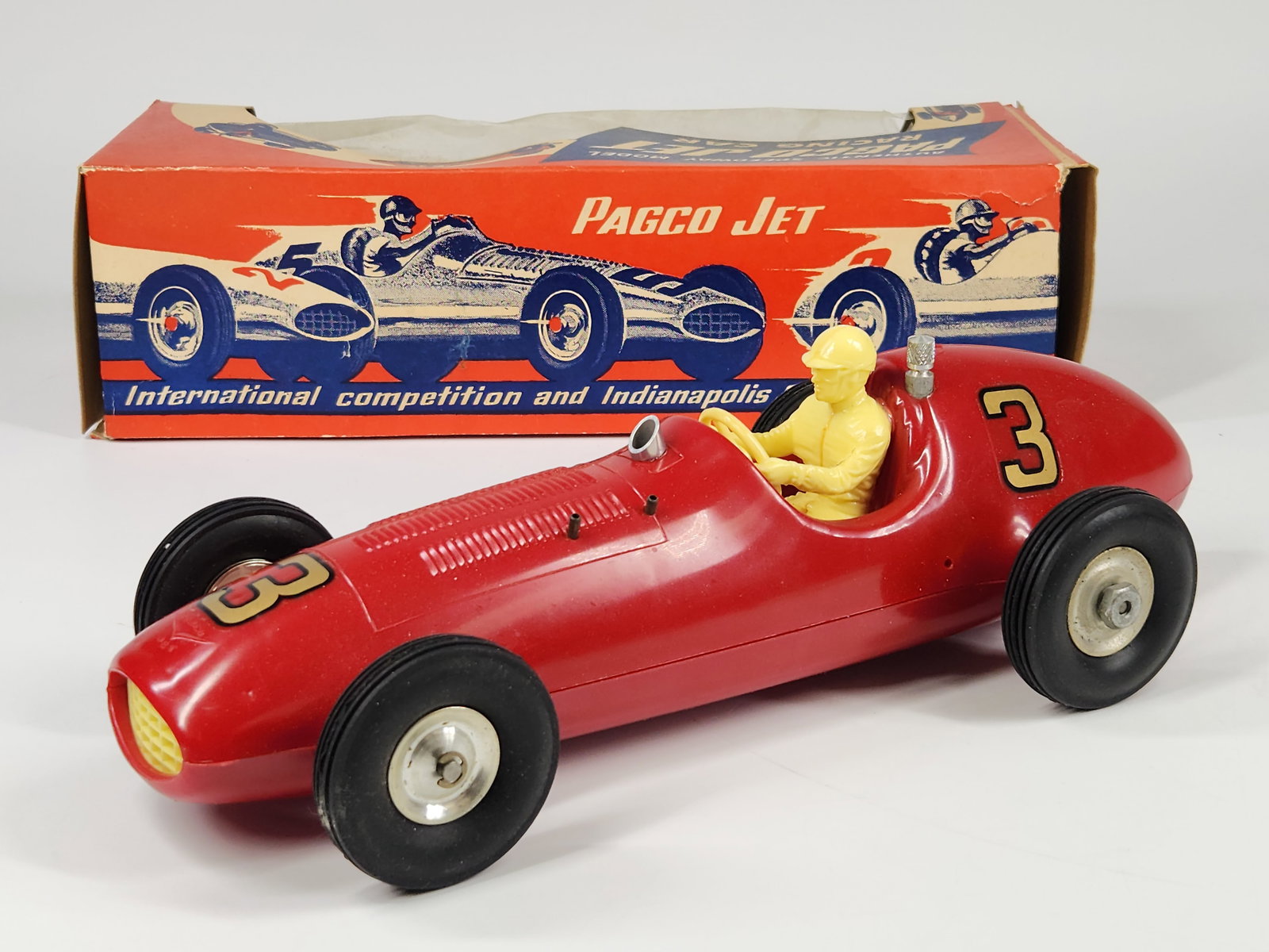 PAGCO GAS POWERED THIMBLE DROME CAR W/ BOX: REMAINS IN EXCELLENT VERY CLEAN CONDITION WITH ORIGINAL BOX. BOX SHOWING SOME WEAR. ALMOST APPEARS UNUSED.