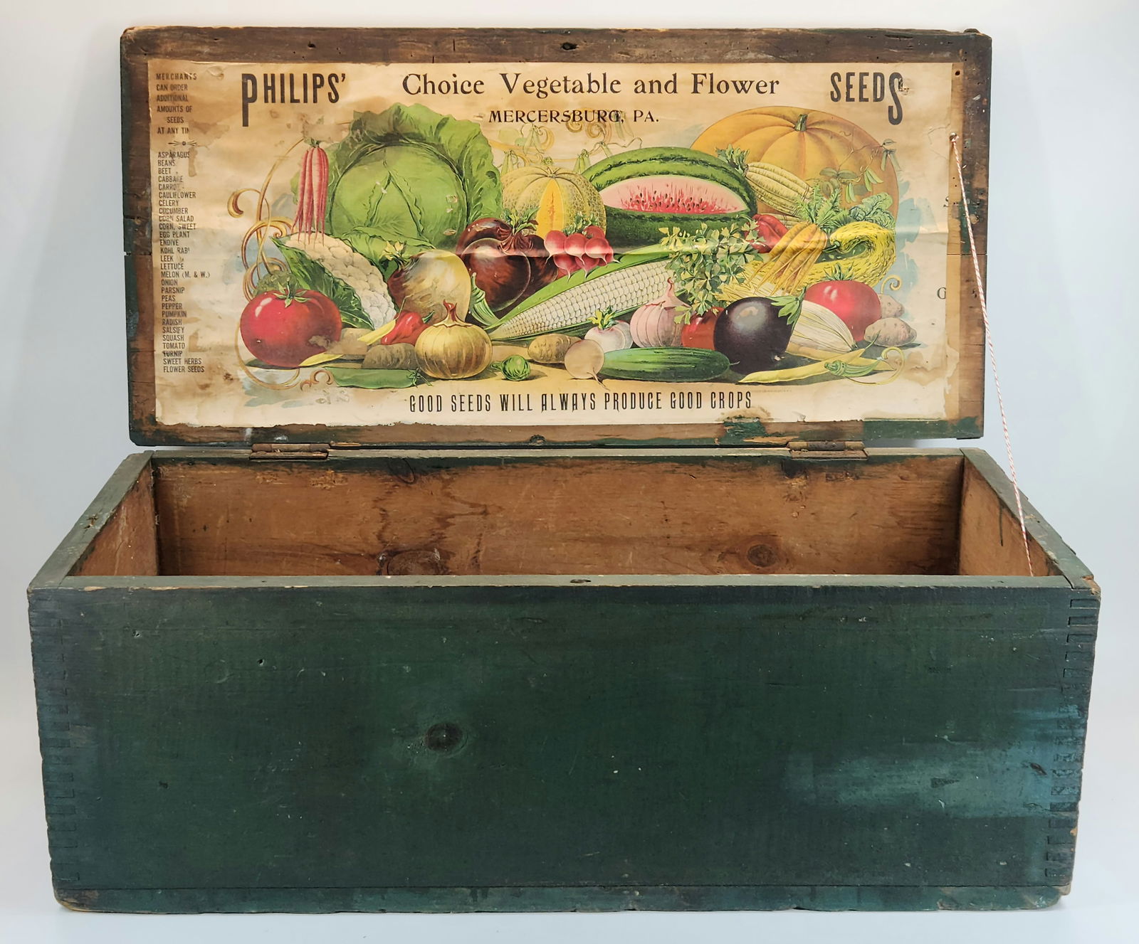 PHILIP'S VEGETABLE & FLOWER SEED BOX: REMAINS IN GOOD CONDITION, SHOWING SOME WEAR. ORIGINAL GREEN PAINT. ORIGINAL LABEL SHOWING SOME WEAR. MEASURES APPROXIMATELY 28" ACROSS.