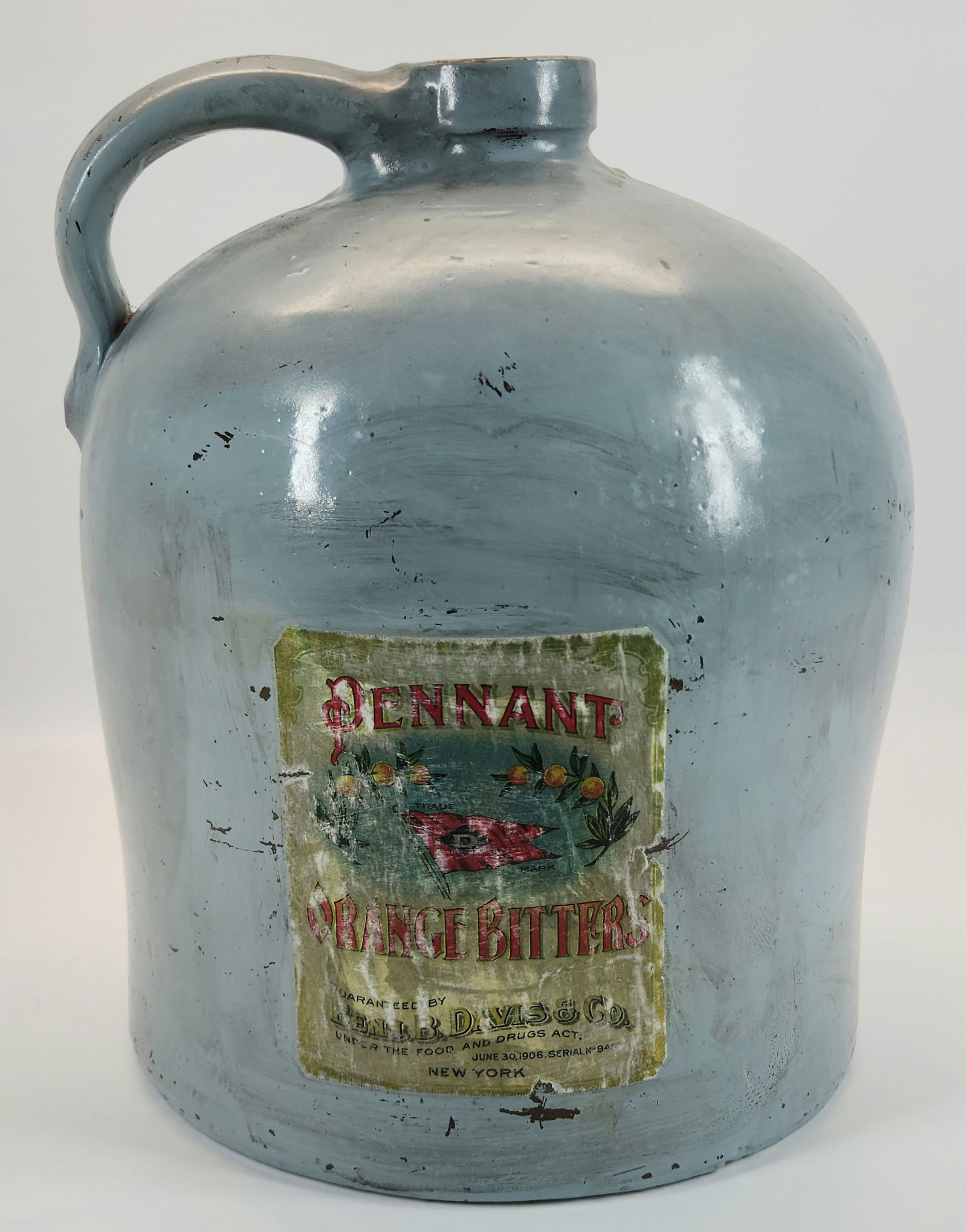 GREY PAINTED STONEWARE JUG W/ HANDLE: REMAINS IN FAIR CONDITION, PAINTED. MEASURES APPROXIMATELY 12" TALL