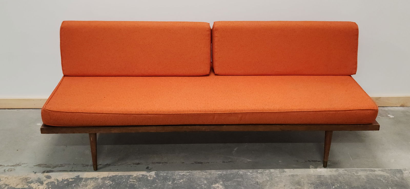 MID CENTURY MODERN WOOD UPHOLSTERED SOFA: REMAINS IN GOOD CONDITION. UPHOLSTERY REMAINS NICE. WOOD SHOWING SOME WEAR NEEDS CLEANED. MEASURES APPROXIMATELY 74" LONG. **PLEASE NOTE** THIS ITEM IS NOT AVAILABLE FOR SHIPPING. LOCAL PICKUP ONLY PL