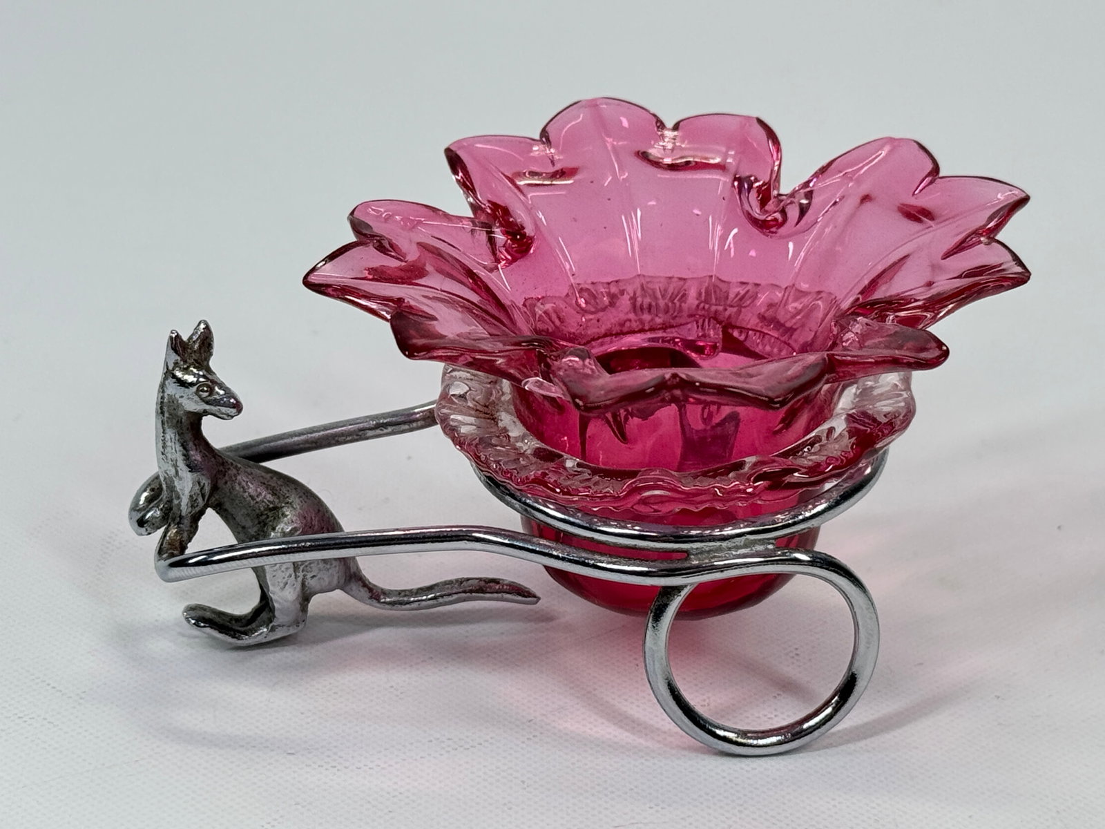 CRANBERRY ART GLASS SALT W/ KANGAROO: REMAINS IN VERY GOOD CONDITION, SHOWING SOME TYPICAL WEAR. NO CHIPS OR CRACKS.