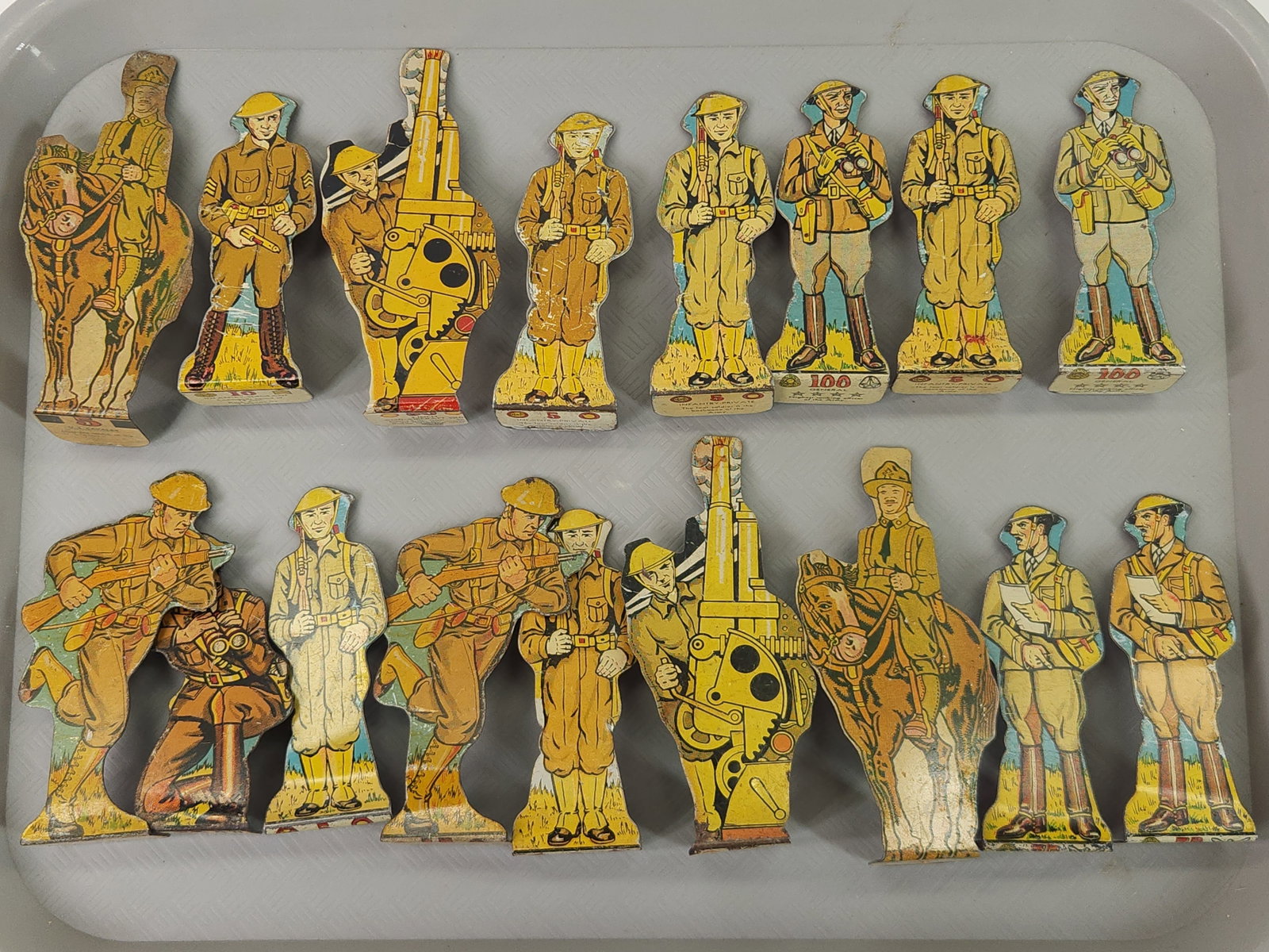 17) MARX PRESSED STEEL SOLDIERS: ALL REMAIN IN GOOD CONDITION, SHOWING SOME TYPICAL USAGE WEAR.
