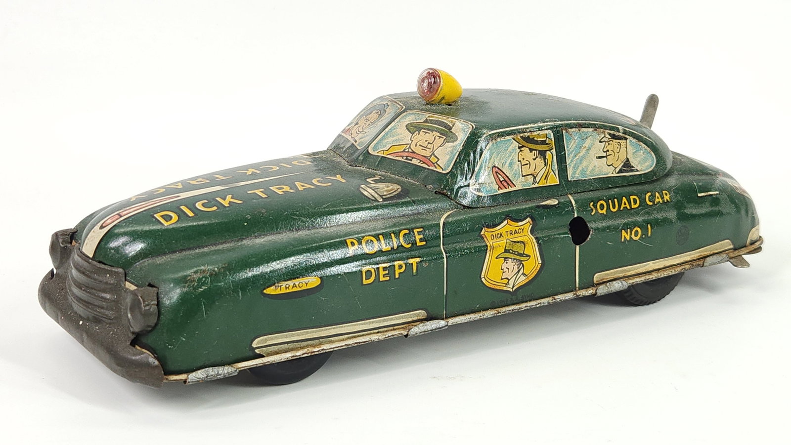MARX TIN BATTERY OP DICY TRACY SQUAD CAR: REMAINS IN FAIR TO GOOD CONDITION, SHOWING SOME TYPICAL WEAR. A FEW SPOTS OF RUST.