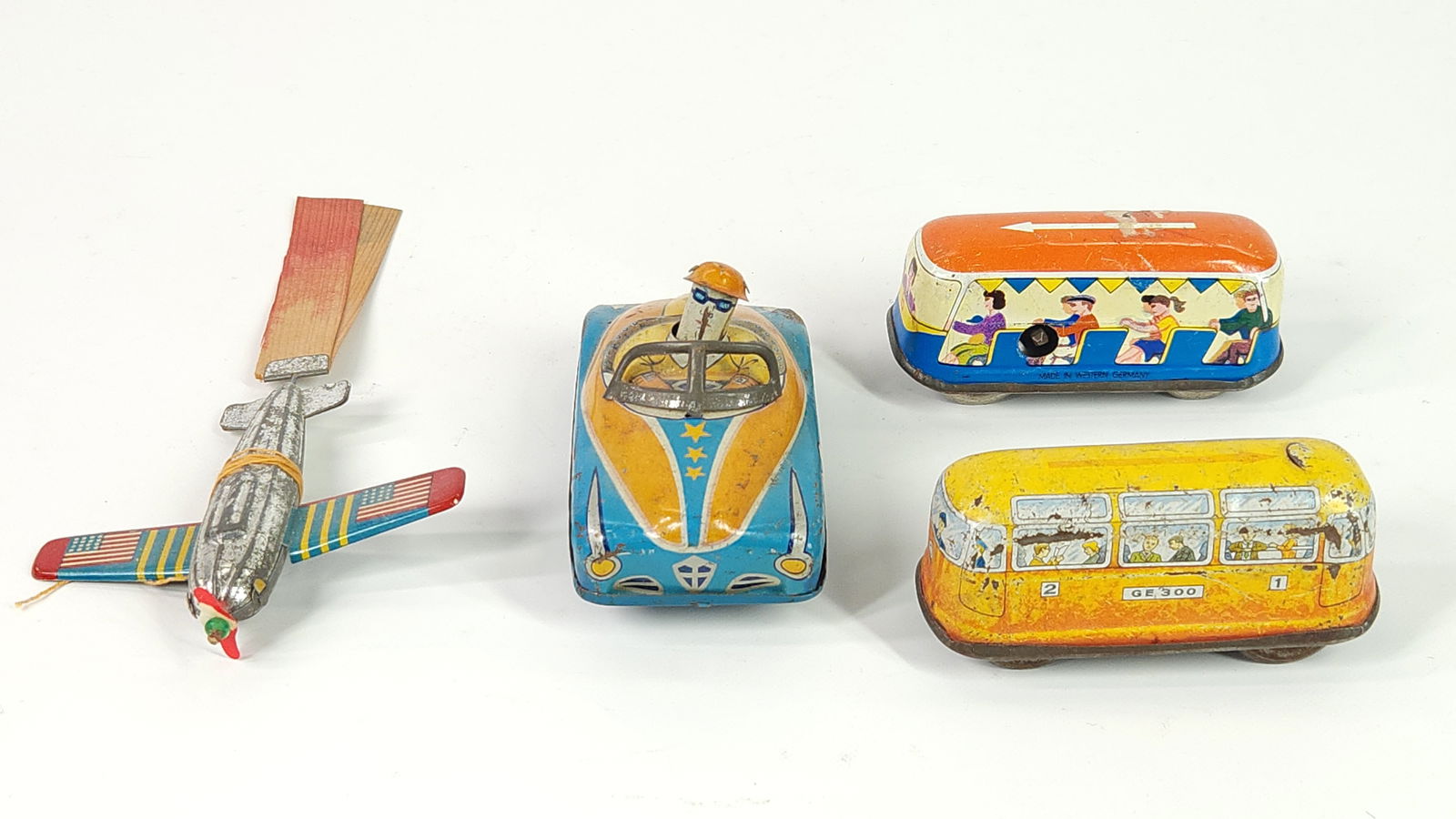 4) VINTAGE TIN LITHO VEHICLES (1 of 6)