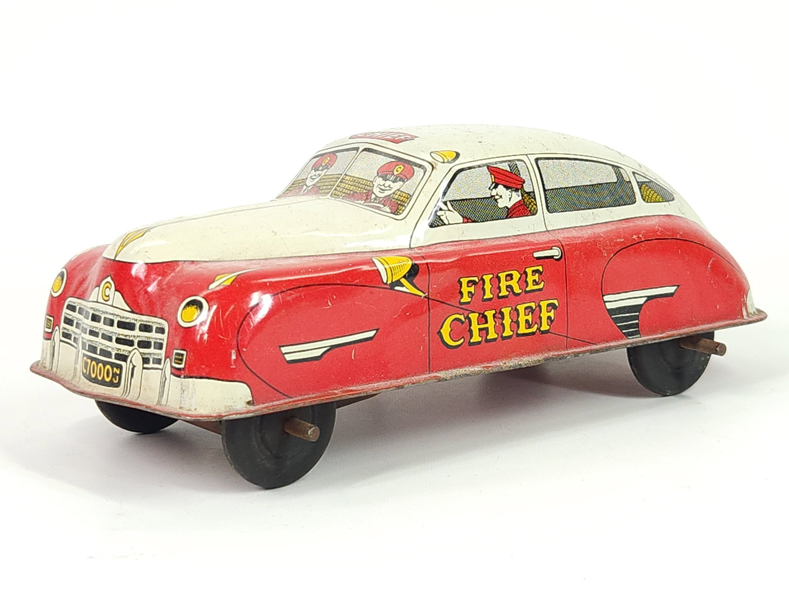 COURTLAND WIND UP FIRE CHIEF CAR W/ SIREN: REMAINS IN GOOD CONDITION, SHOWING SOME TYPICAL WEAR.