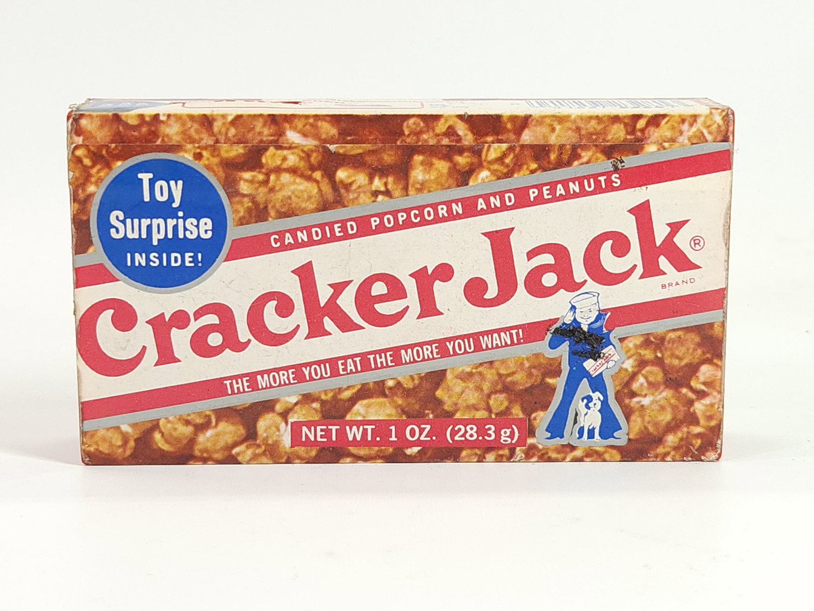 VINTAGE CRACKER JACK NOVELTY RADIO: REMAINS IN FAIR CONDITION. BATTERY COMPARTMENT SHOWING WEAR. NOT WORKING.