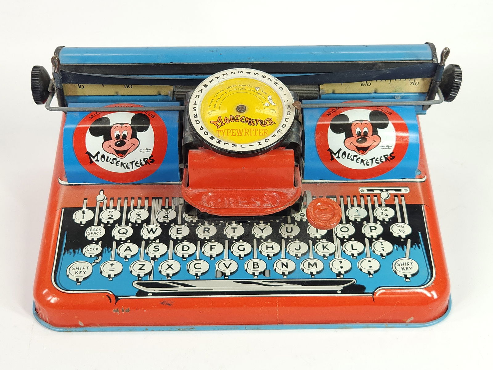 T. COHN MICKEY MOUSE CLUB MOUSEKETEERS TYPEWRITER: REMAINS IN GOOD CONDITION, SHOWING SOME TYPICAL WEAR.
