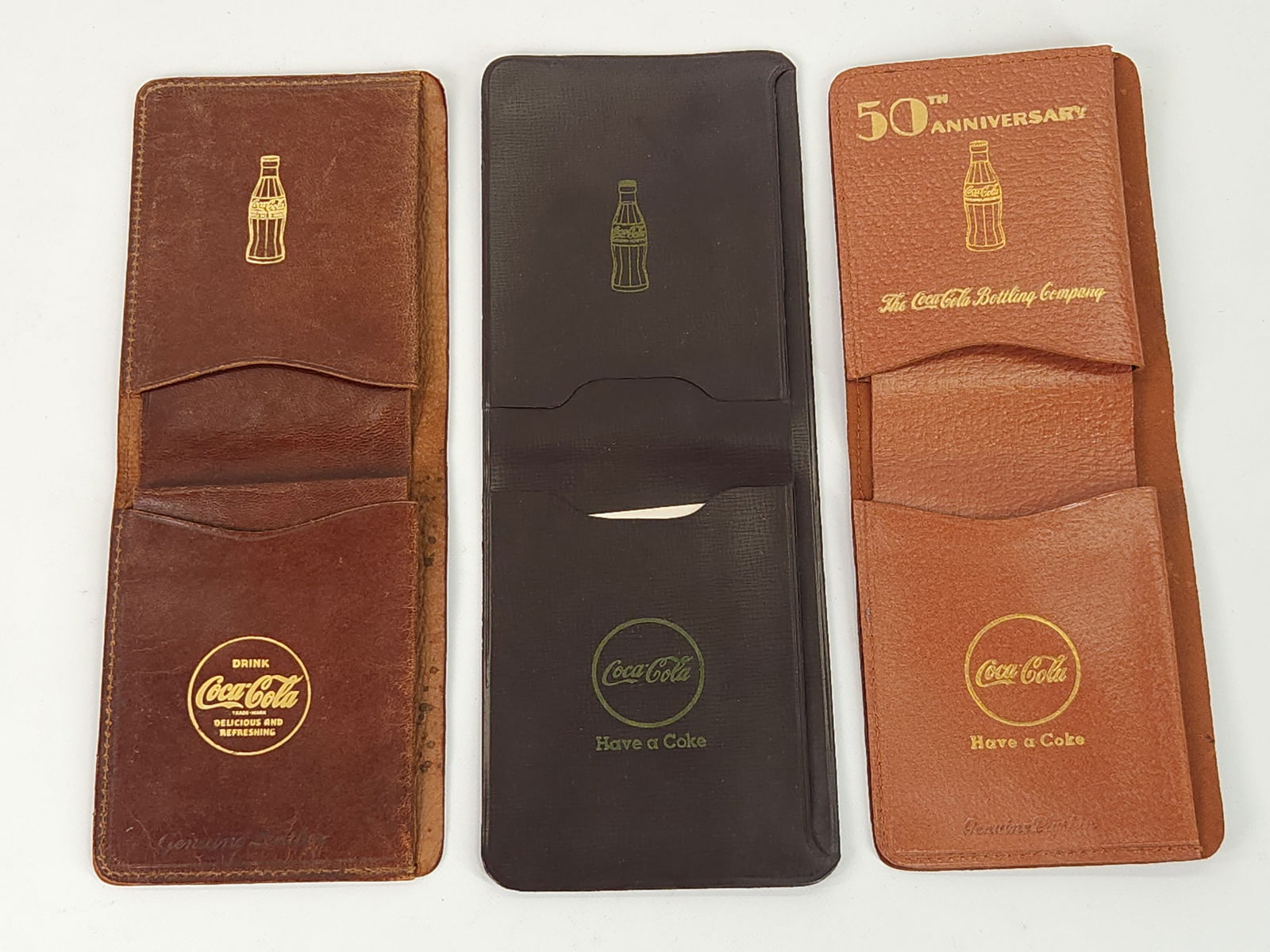 3) ANTIQUE COCA COLA LEATHER WALLETS (1 of 2)