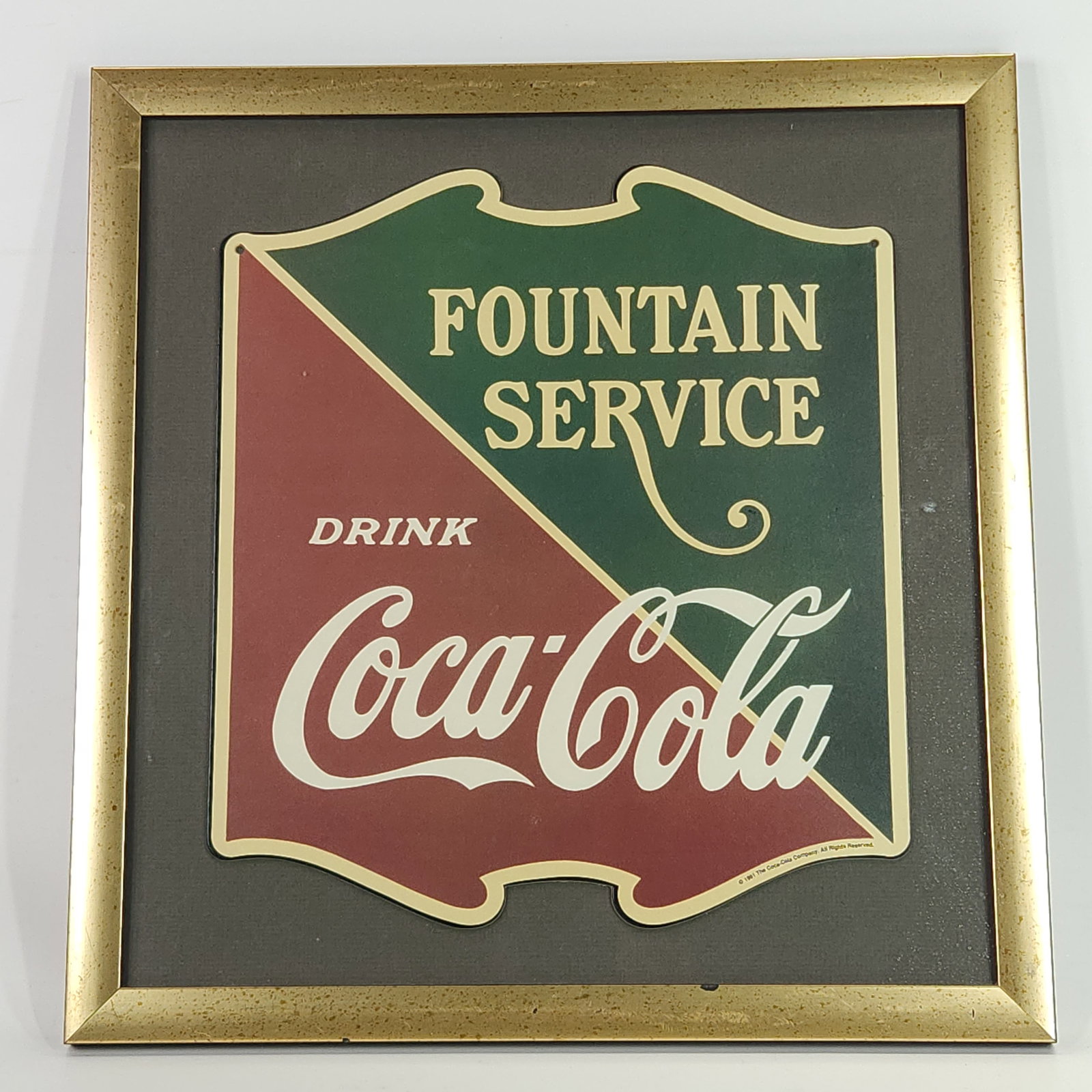 1991 COCA COLA GLASS FRAMED: REMAINS IN EXCELLENT CONDITION.