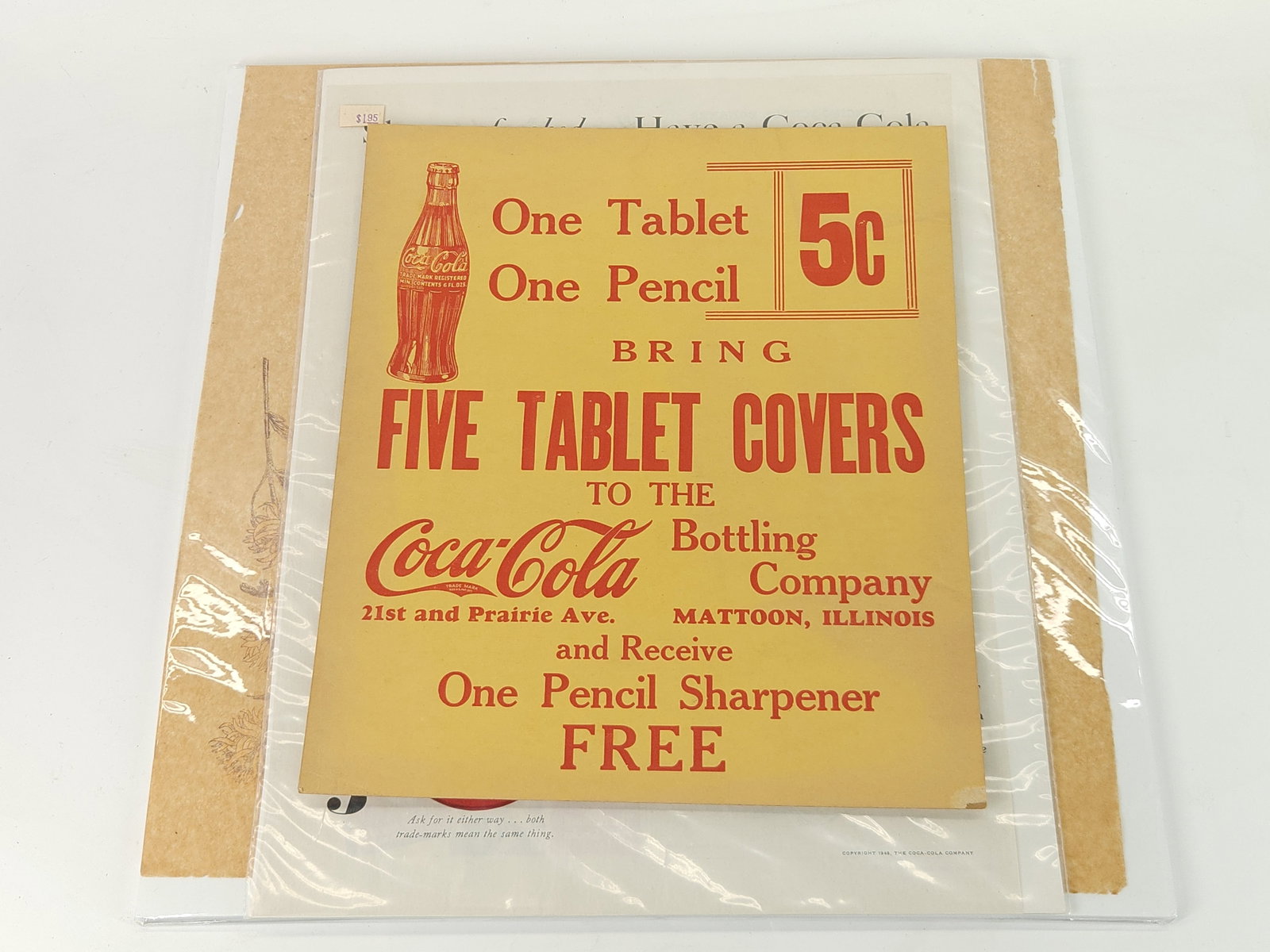 COCA COLA SIGN, AD & TISSUE PAPER: ALL REMAIN IN GOOD CONDITION, SHOWING SOME TYPICAL WEAR.