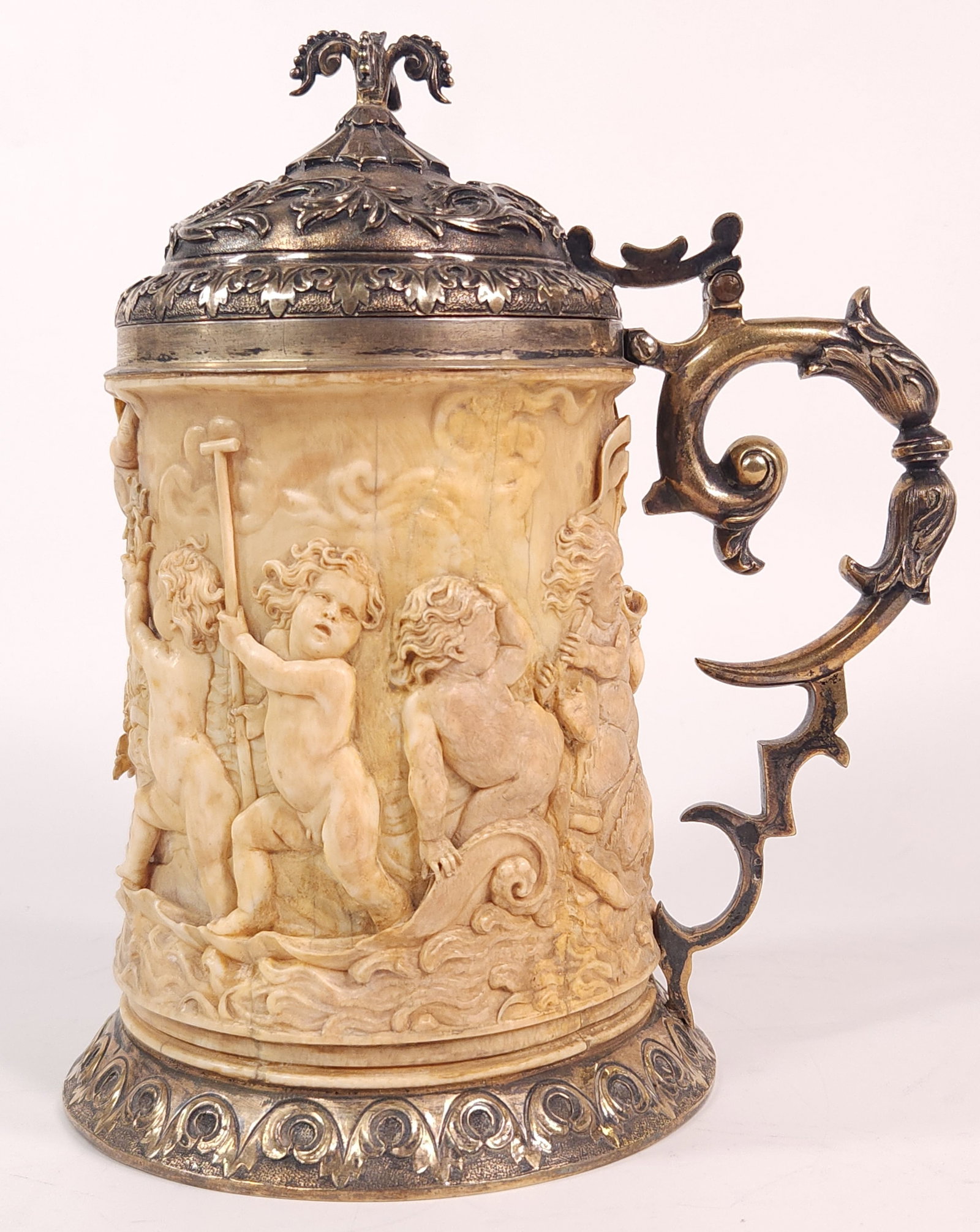 FINE ANTIQUE BONE & STERLING SILVER CARVED TANKARD STEIN: REMAINS IN GOOD CONDITION, SHOWING SOME TYPICAL WEAR. A FEW CRACKS IN THE BONE AS SHOWN. SILVER NEED POLISHED.