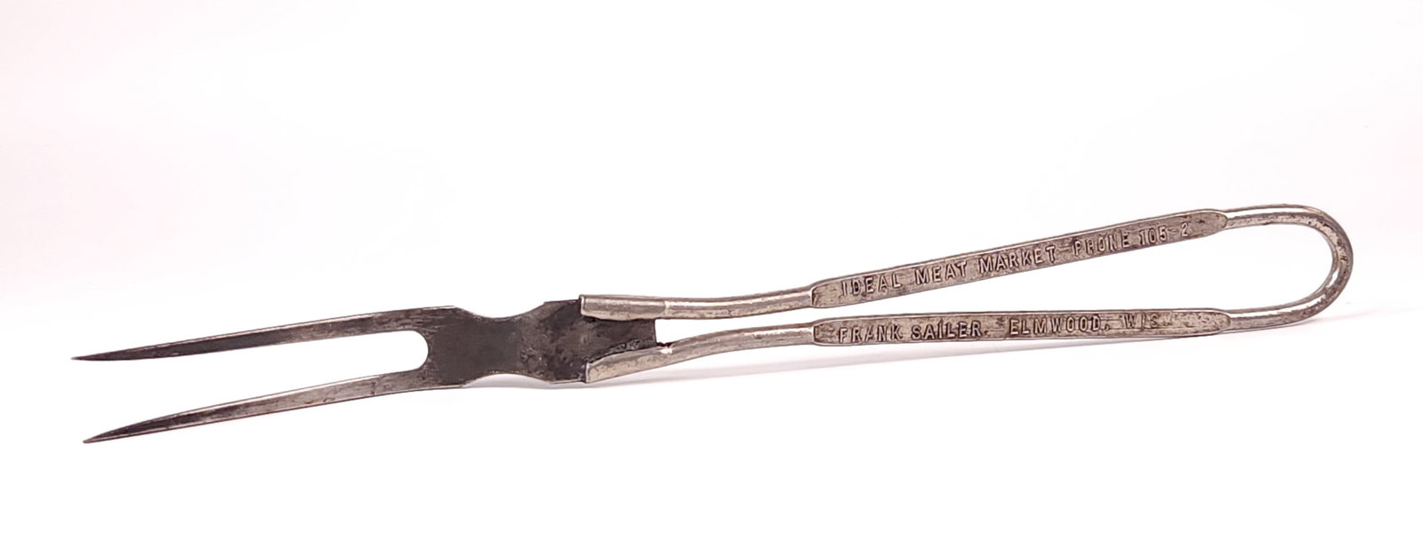 FRANK SAILER ELMWOOD WIS. MERRY CHRISTMAS MEAT FORK: REMAINS IN GOOD CONDITION, SHOWING SOME TYPICAL WEAR.
