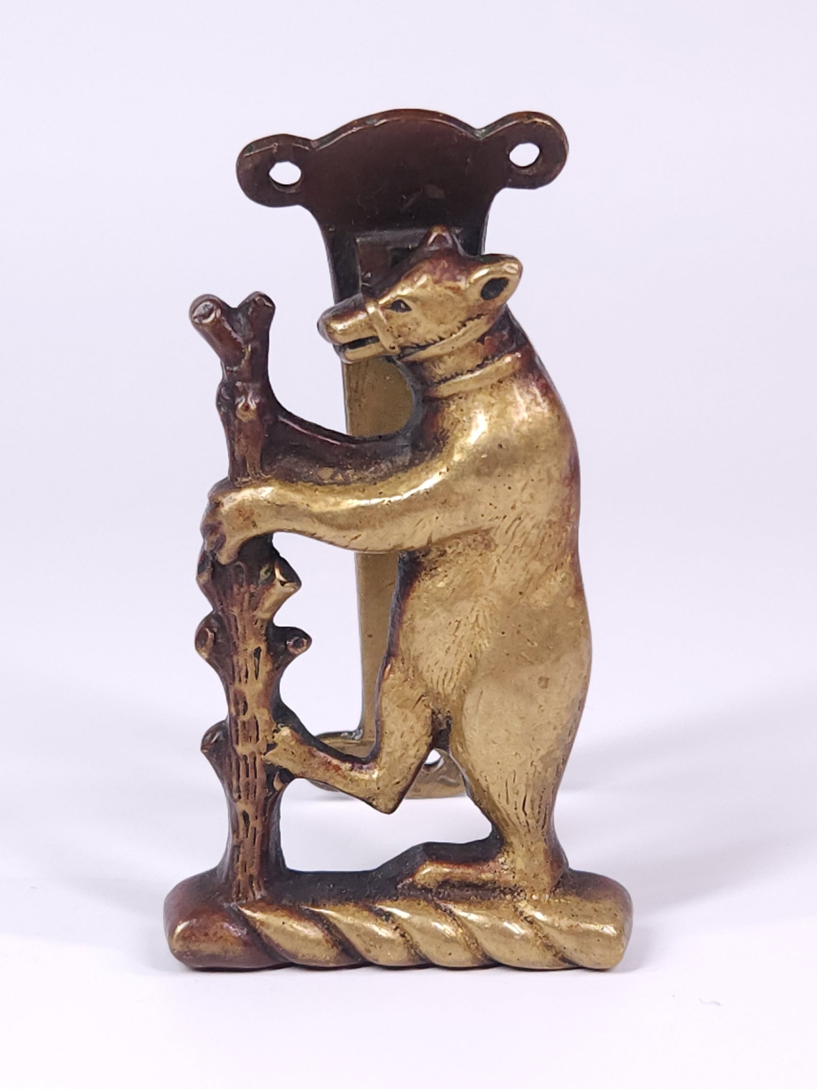 ANTIQUE BRASS BEAR W/ MUZZLE DOOR KNOCKER: REMAINS IN FAIR TO GOOD CONDITION, SHOWING TYPICAL WEAR CONSISTENT WITH AGE AND USE.