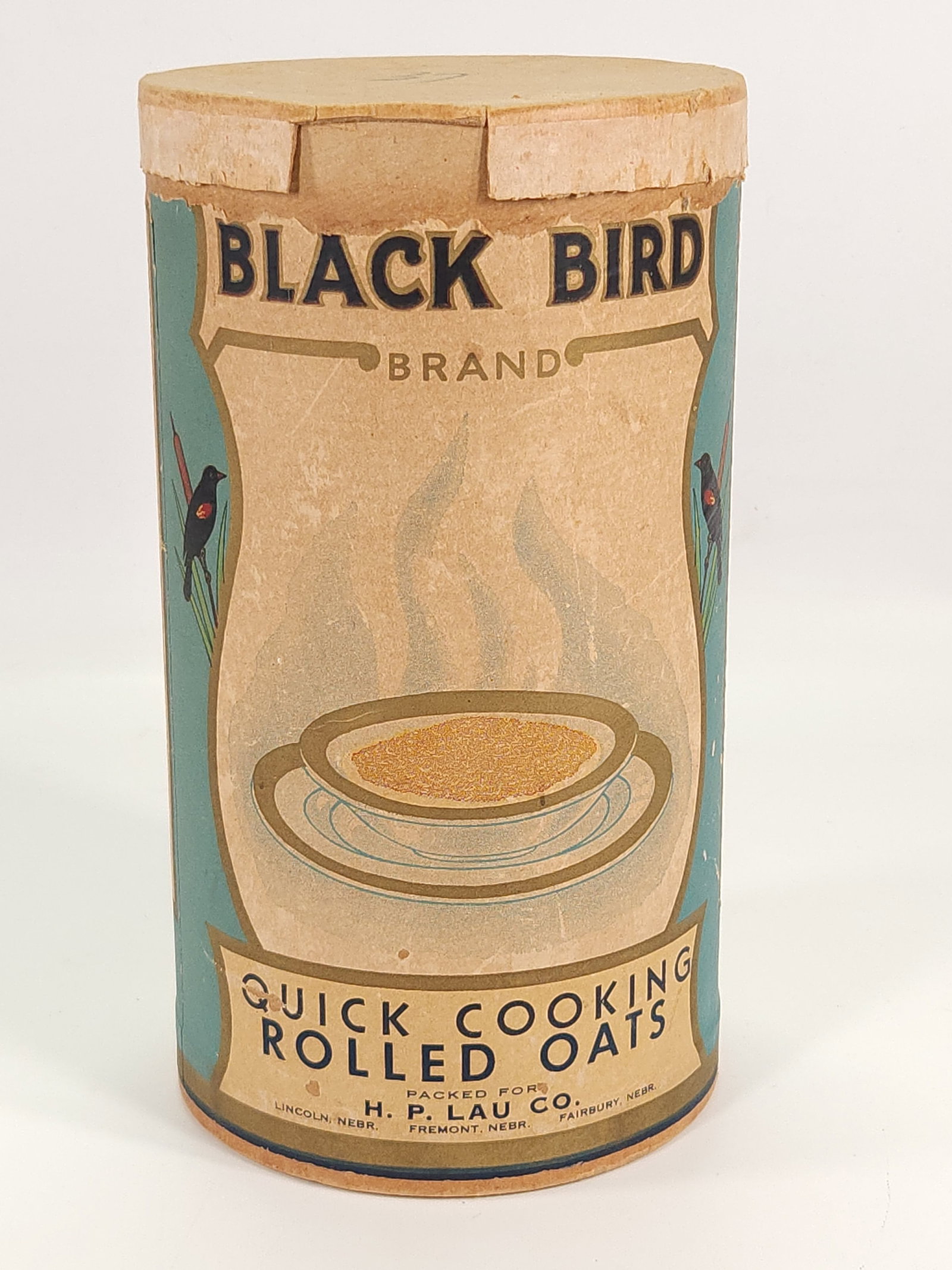 ANTIQUE BLACK BIRD ROLLED OATS CONTAINER (1 of 3)